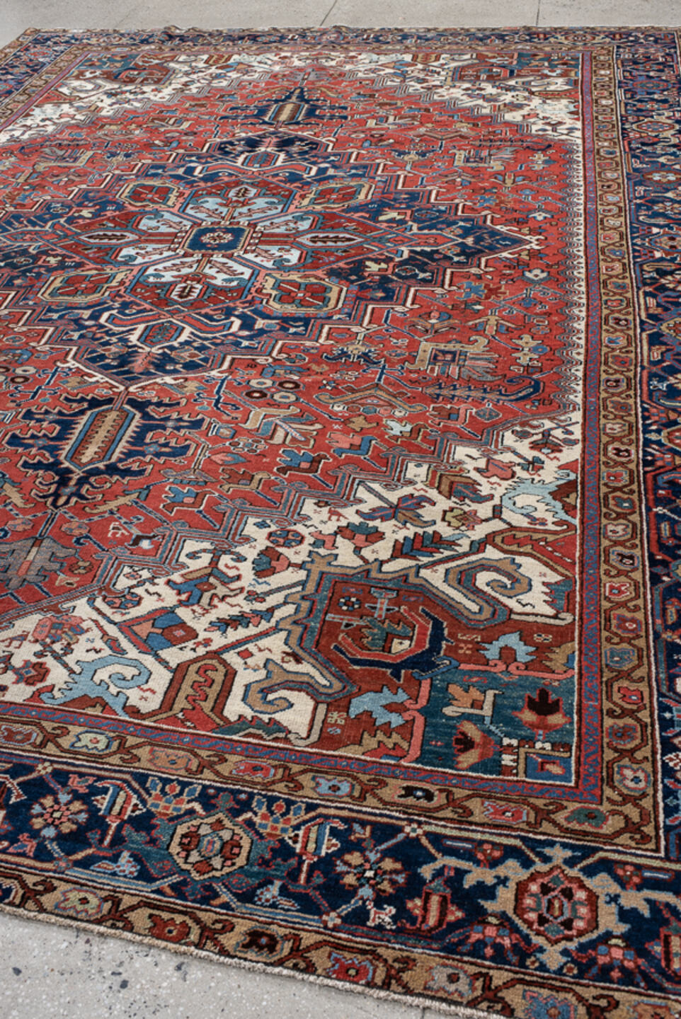 9' x 12' one-of-a-kind handmade vintage Heriz large size rug. Color palette: arapawa, black, blue, brown, dark gray