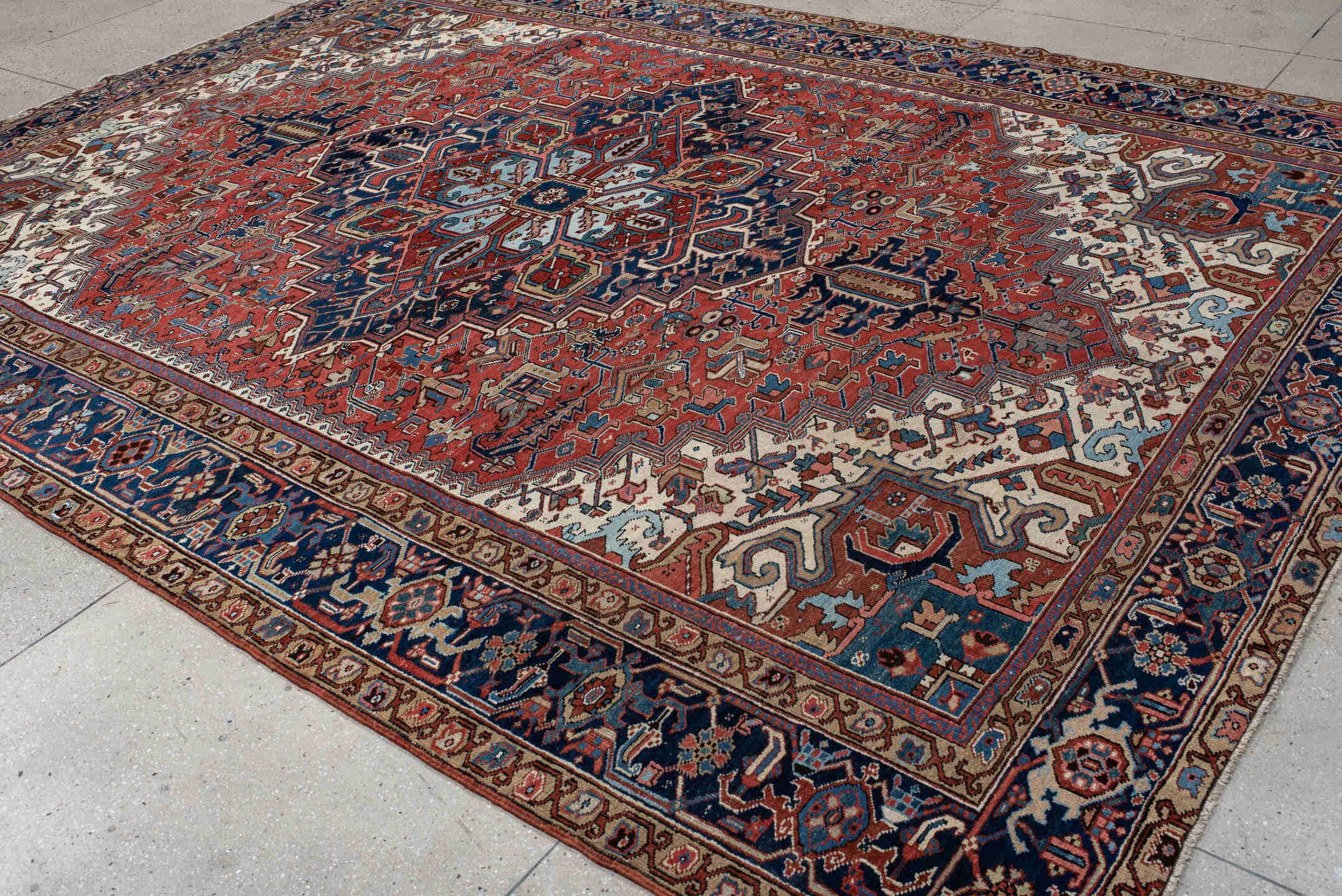 9' x 12' one-of-a-kind handmade vintage Heriz large size rug. Color palette: rust, navy, ivory, sky_blue, camel, terracotta