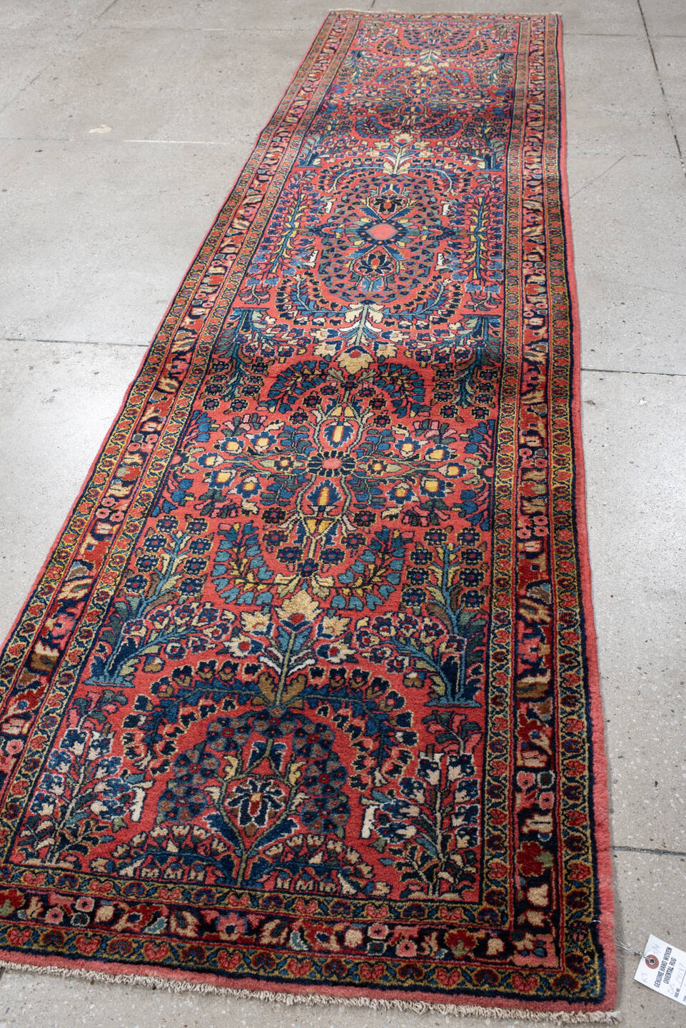 2' x 12' one-of-a-kind handmade antique Sarouk runner rug. Color palette: rust, navy, ivory, rose, teal, gold, burgundy