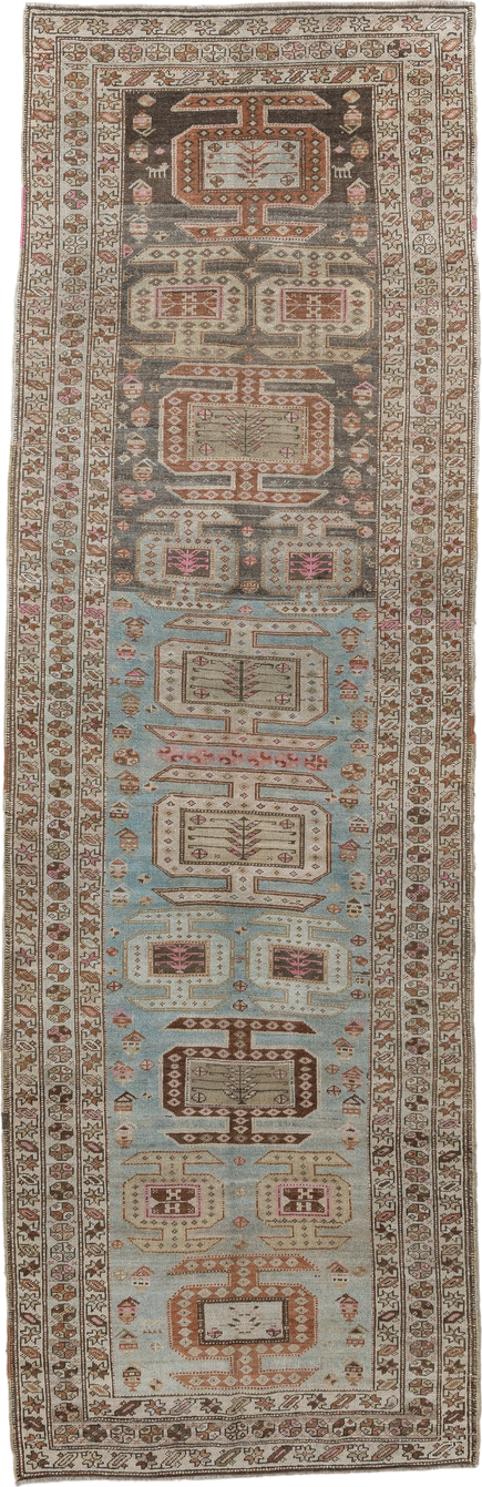 3' x 11' one-of-a-kind handmade vintage  runner rug. Color palette: ivory, sky blue, brown, rust, taupe, rose, charcoal