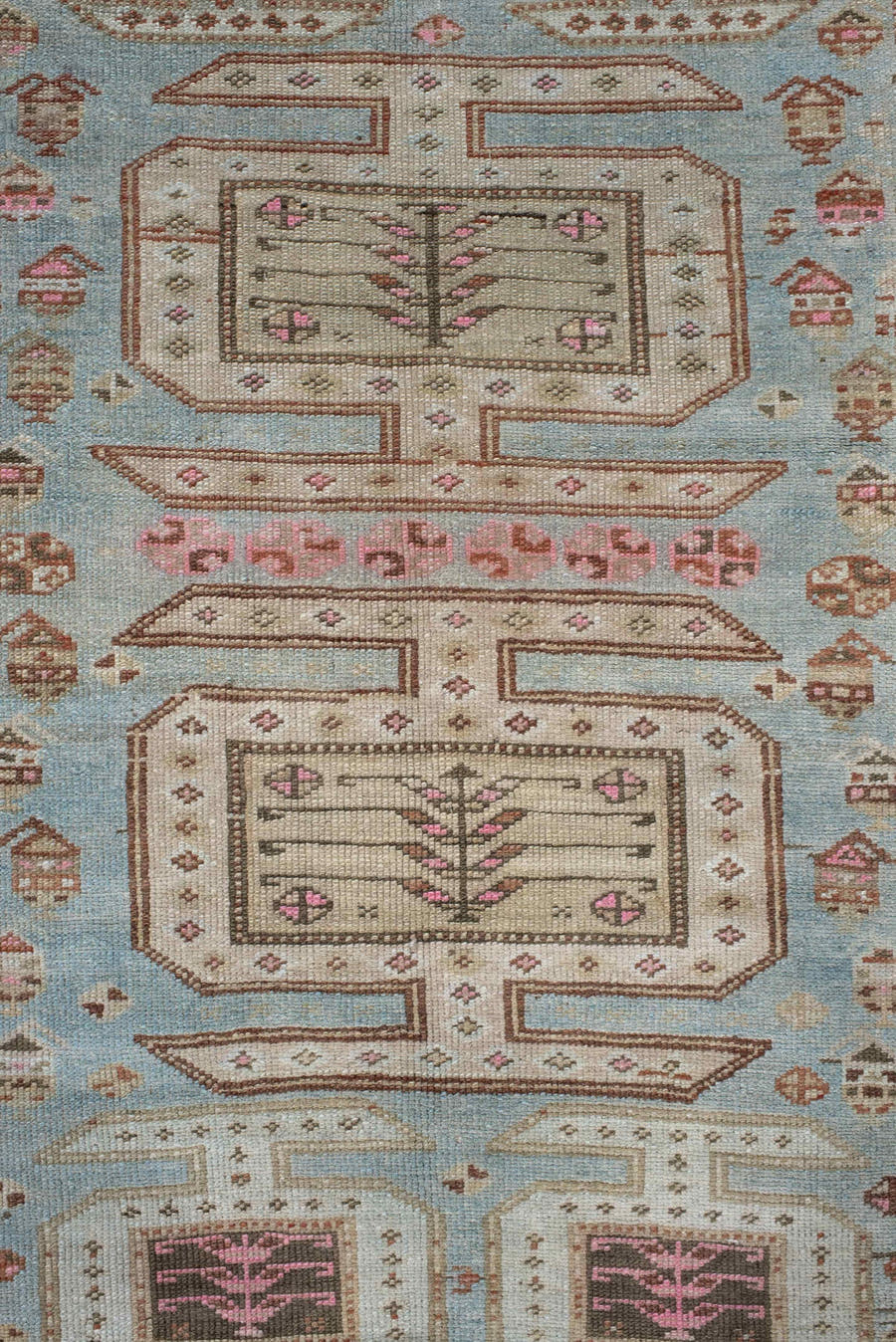 3' x 11' one-of-a-kind handmade vintage  runner rug. Color palette: ivory, sky blue, brown, rust, taupe, rose, charcoal