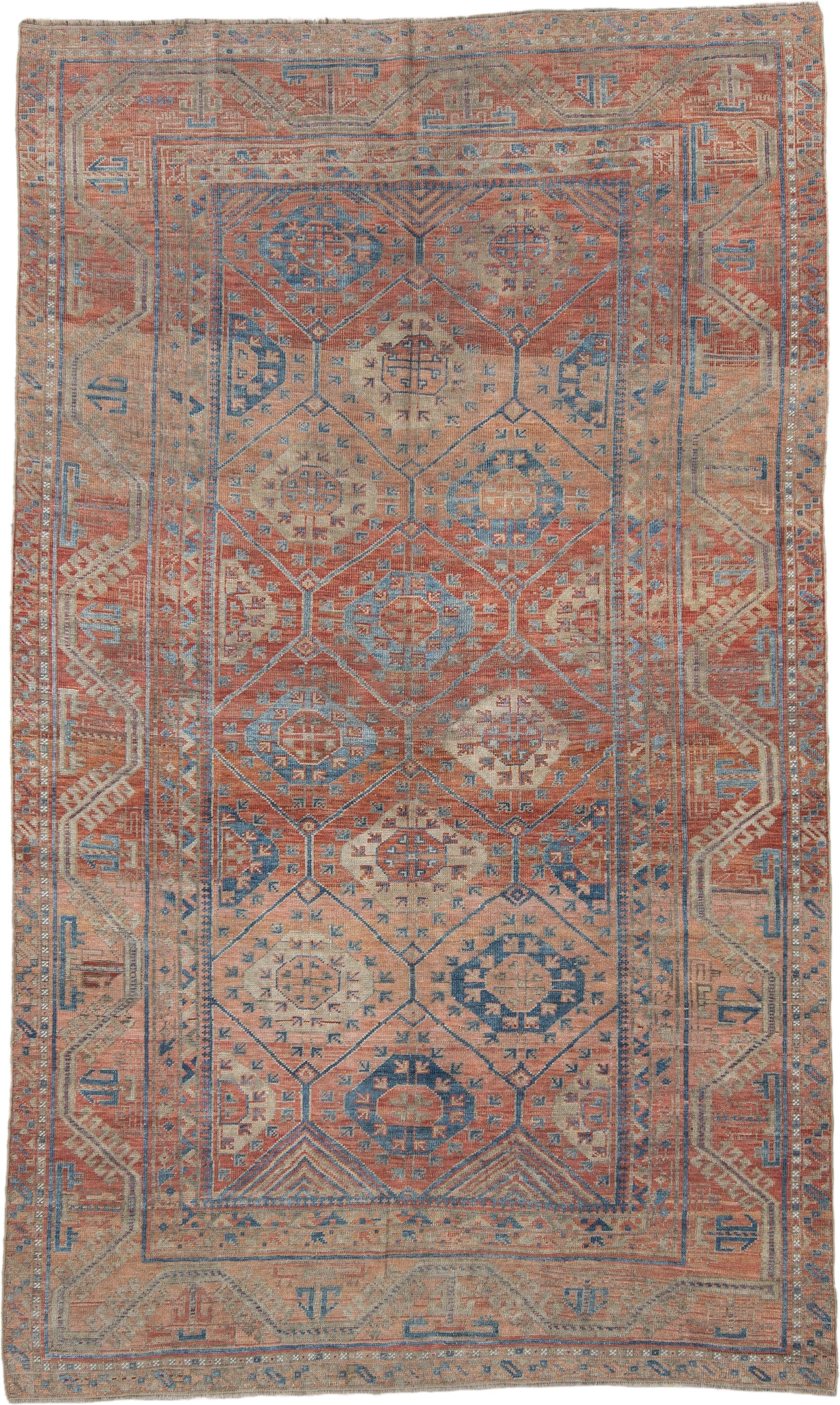 6' x 10' one-of-a-kind handmade antique Belouch large size rug. Color palette: rust, ivory, blue, terra cotta, camel, slate