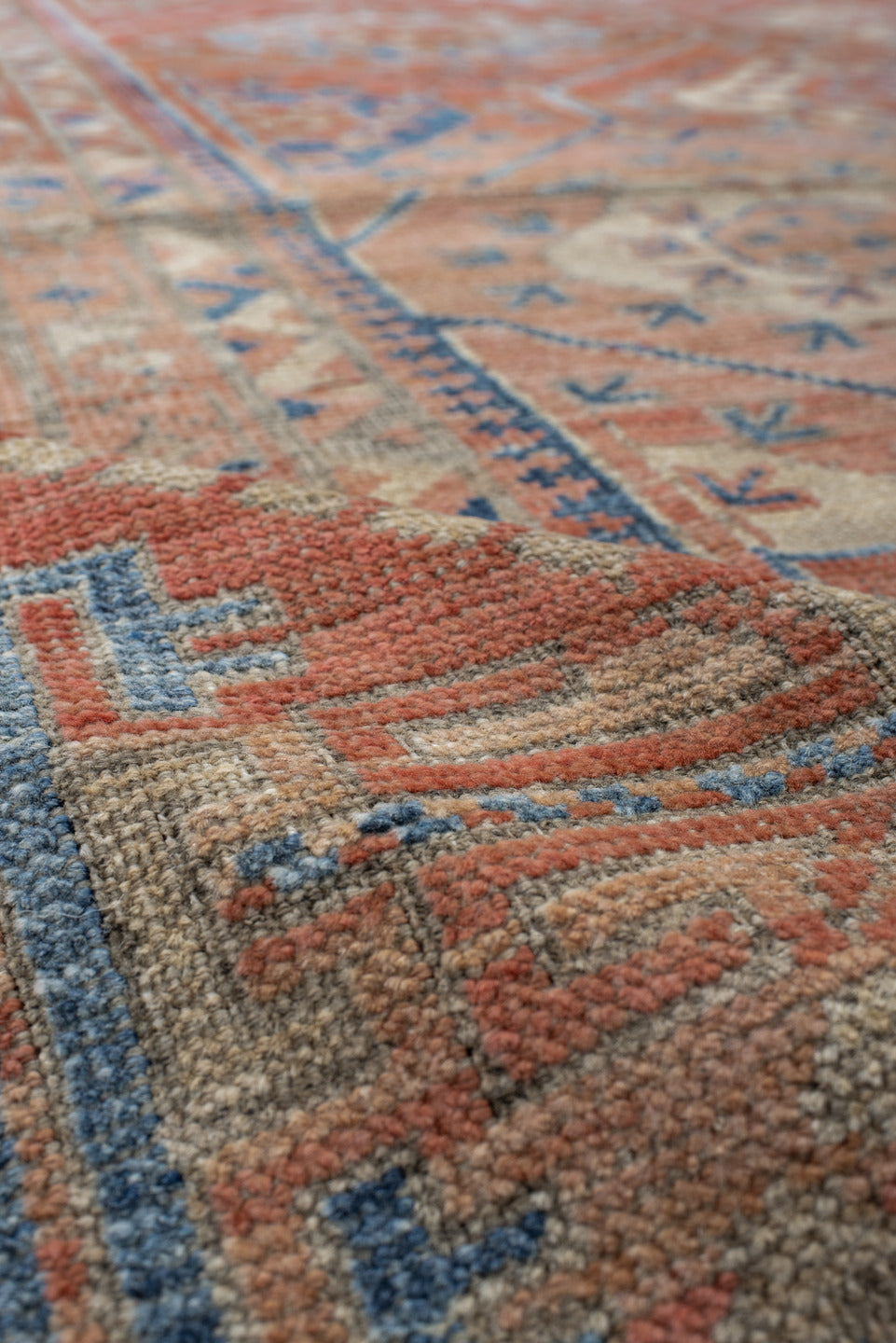 6' x 10' one-of-a-kind handmade vintage Belouch large size rug. Color palette: gray, blue, red, brown, light gray, pink