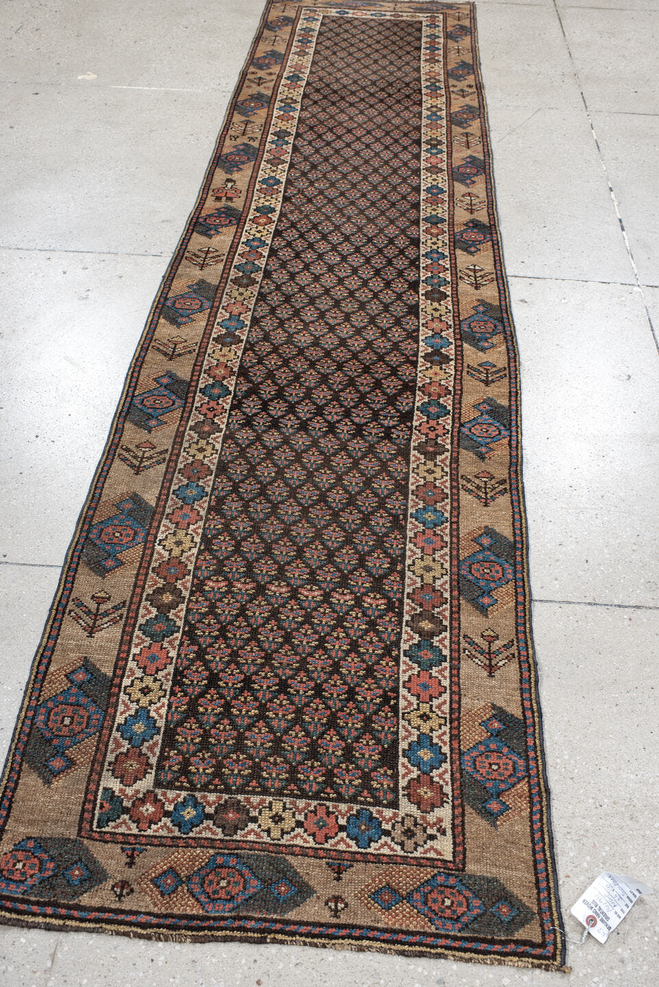 2' x 11' one-of-a-kind handmade vintage NW Persian runner rug. Color palette: navy, ivory, rust, blue, camel, rose, charcoal