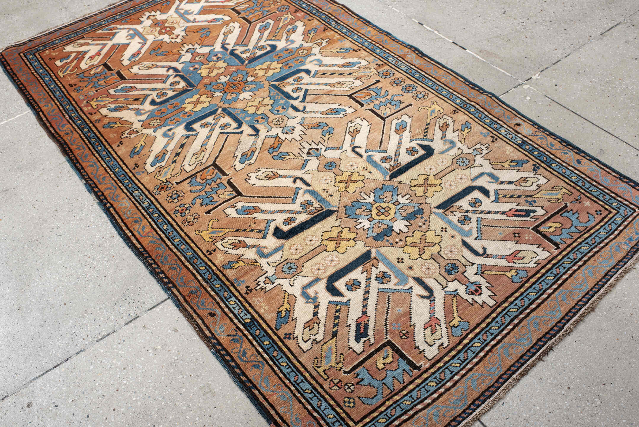 3' x 6' one-of-a-kind handmade vintage Kazak small size rug. Color palette: terra cotta, ivory, sky blue, navy, gold, brown
