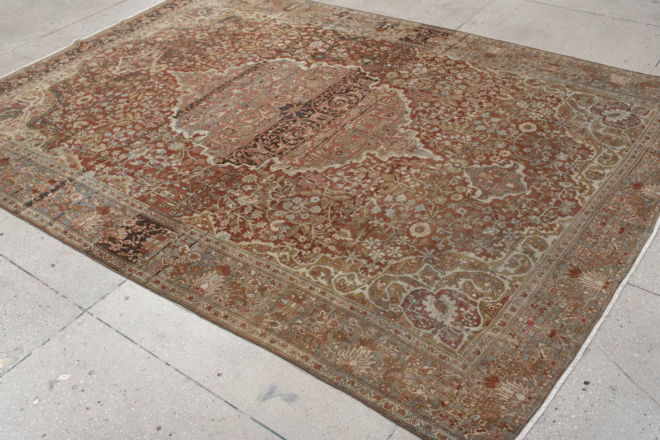 7' x 9' one-of-a-kind handmade antique Far.Sarouk rug. Color palette: rust, terracotta, ivory, slate, taupe, camel, charcoal