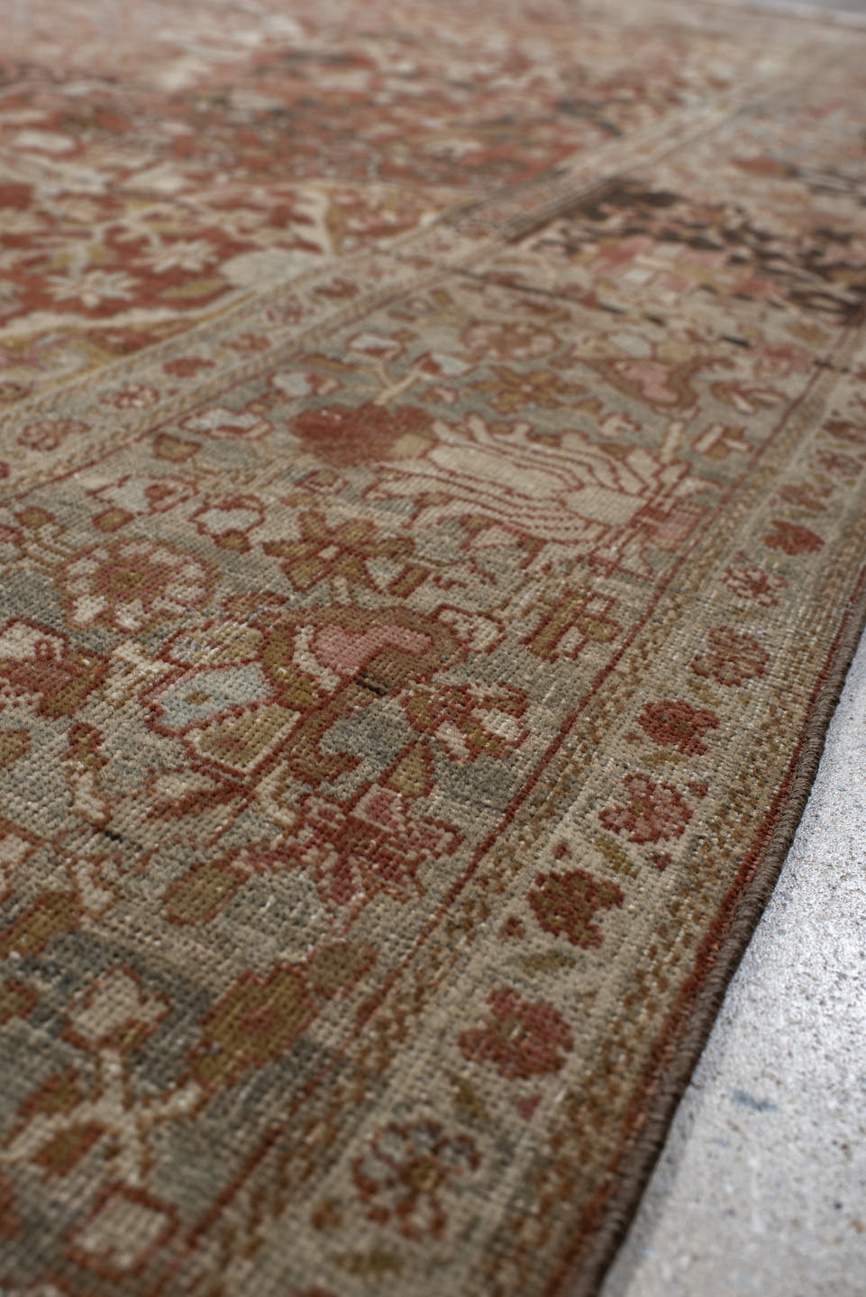 7' x 9' one-of-a-kind handmade antique Far.Sarouk rug. Color palette: rust, terracotta, ivory, slate, taupe, camel, charcoal