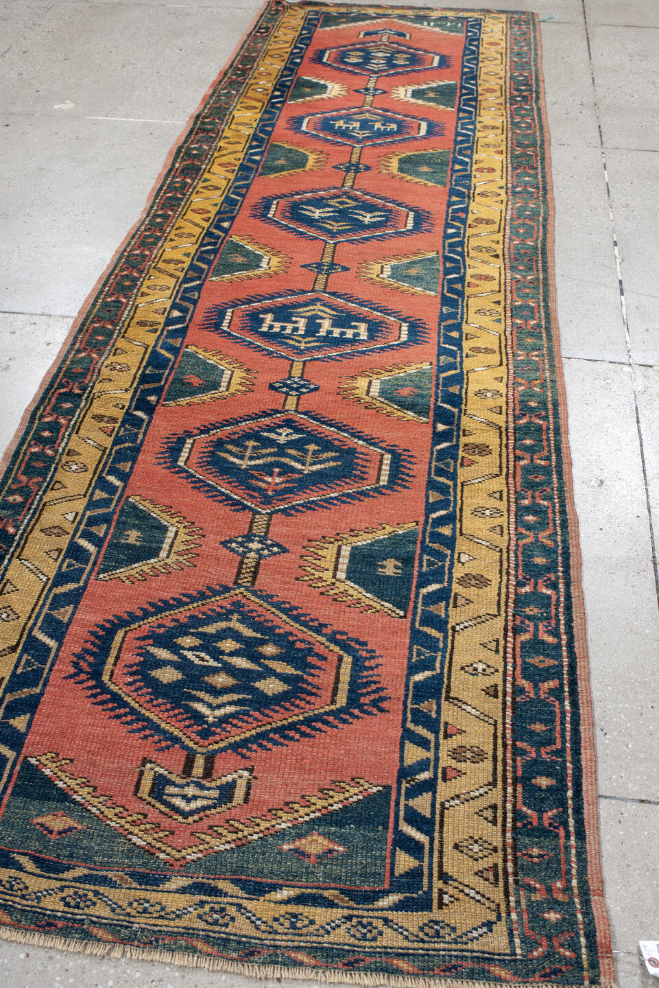 3' x 10' one-of-a-kind handmade vintage NW Persian runner rug. Color palette: rose, indigo, ivory, gold, teal, rust, pink