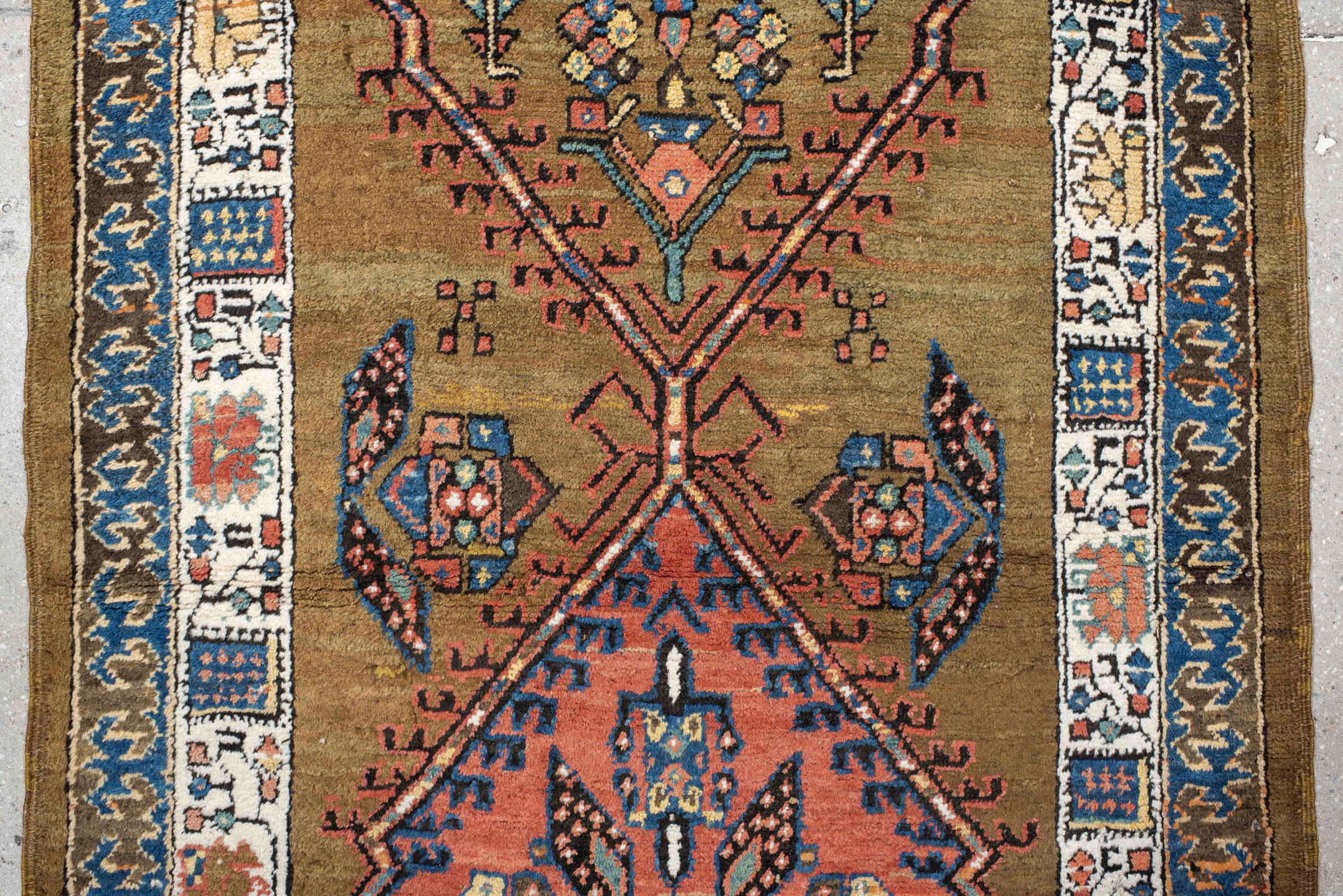 3' x 16' one-of-a-kind handmade vintage Sarab runner rug. Color palette: camel, rust, ivory, navy, terra cotta, indigo, rose