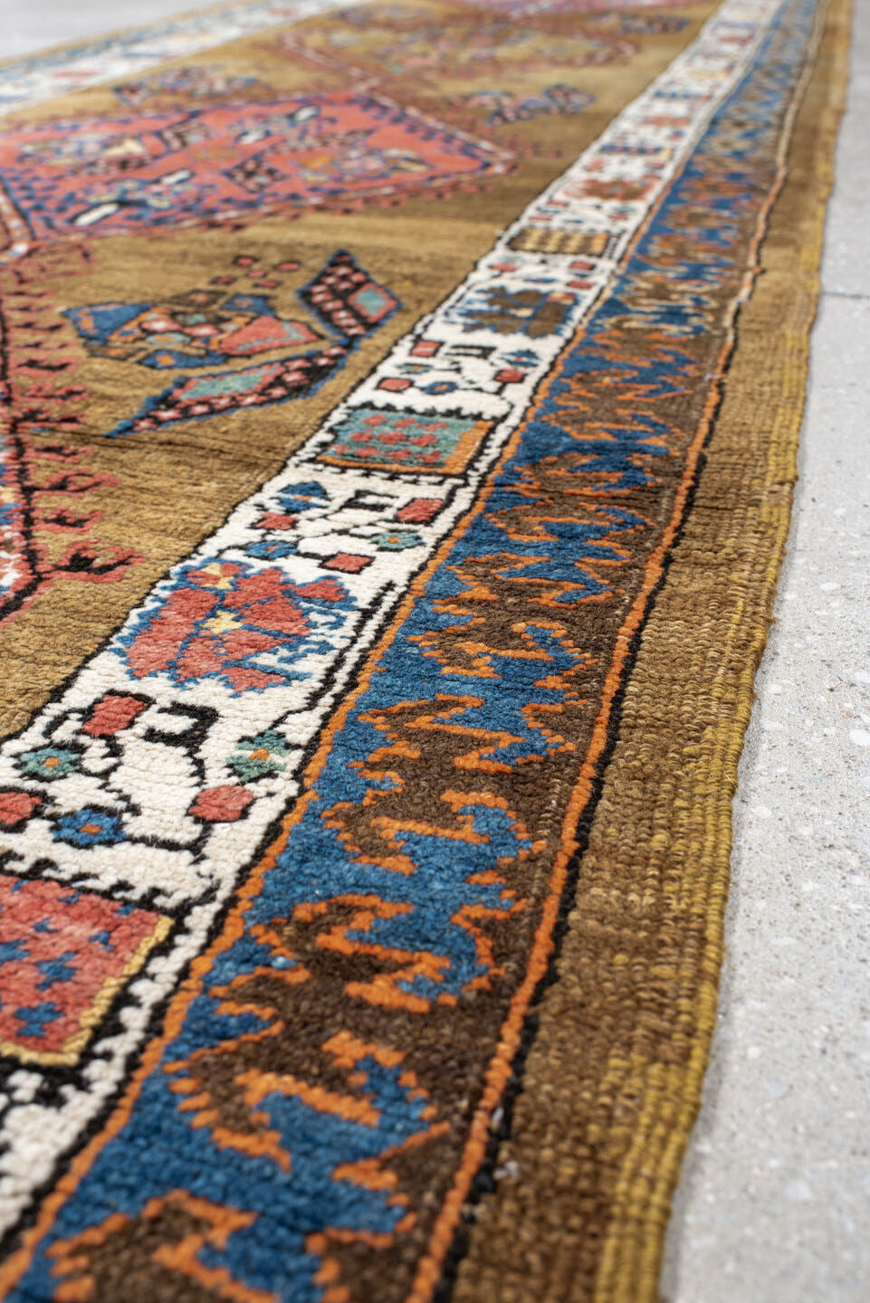 3' x 16' one-of-a-kind handmade vintage Sarab runner rug. Color palette: camel, rust, ivory, navy, terra cotta, indigo, rose