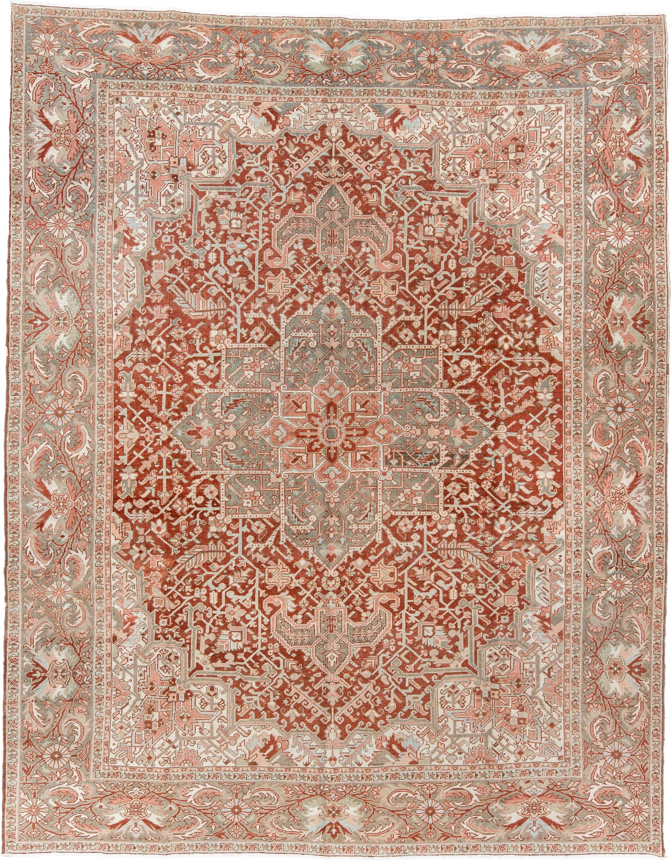 12' x 9' one-of-a-kind handmade vintage Heriz rug. Color palette: terracotta, ivory, pale blue, blue gray, camel, rust