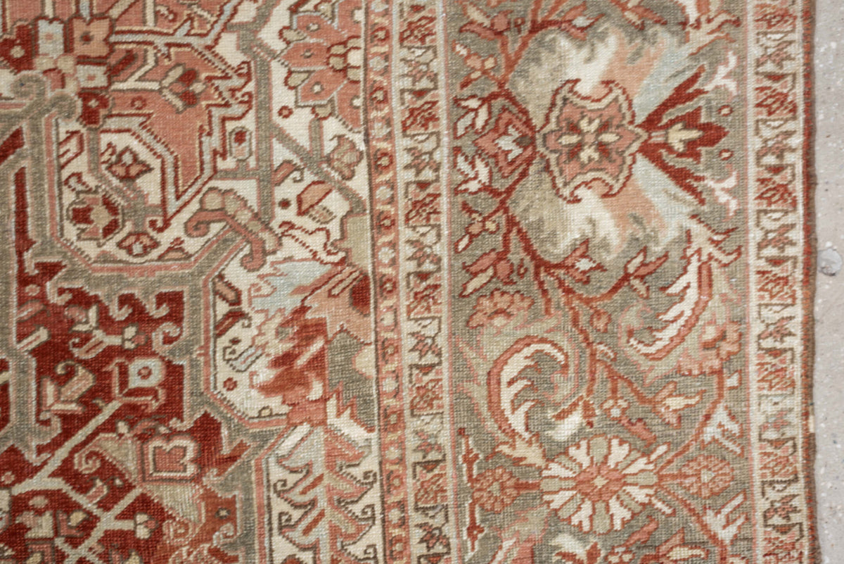 12' x 9' one-of-a-kind handmade vintage Heriz rug. Color palette: terracotta, ivory, pale blue, blue gray, camel, rust