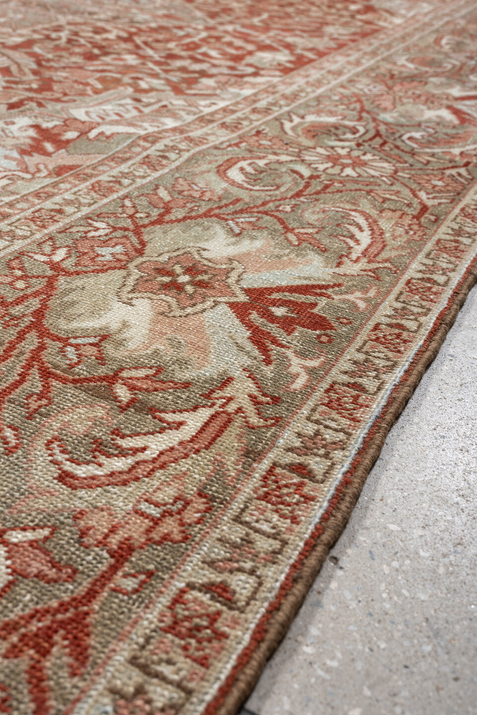 12' x 9' one-of-a-kind handmade vintage Heriz rug. Color palette: terracotta, ivory, pale blue, blue gray, camel, rust