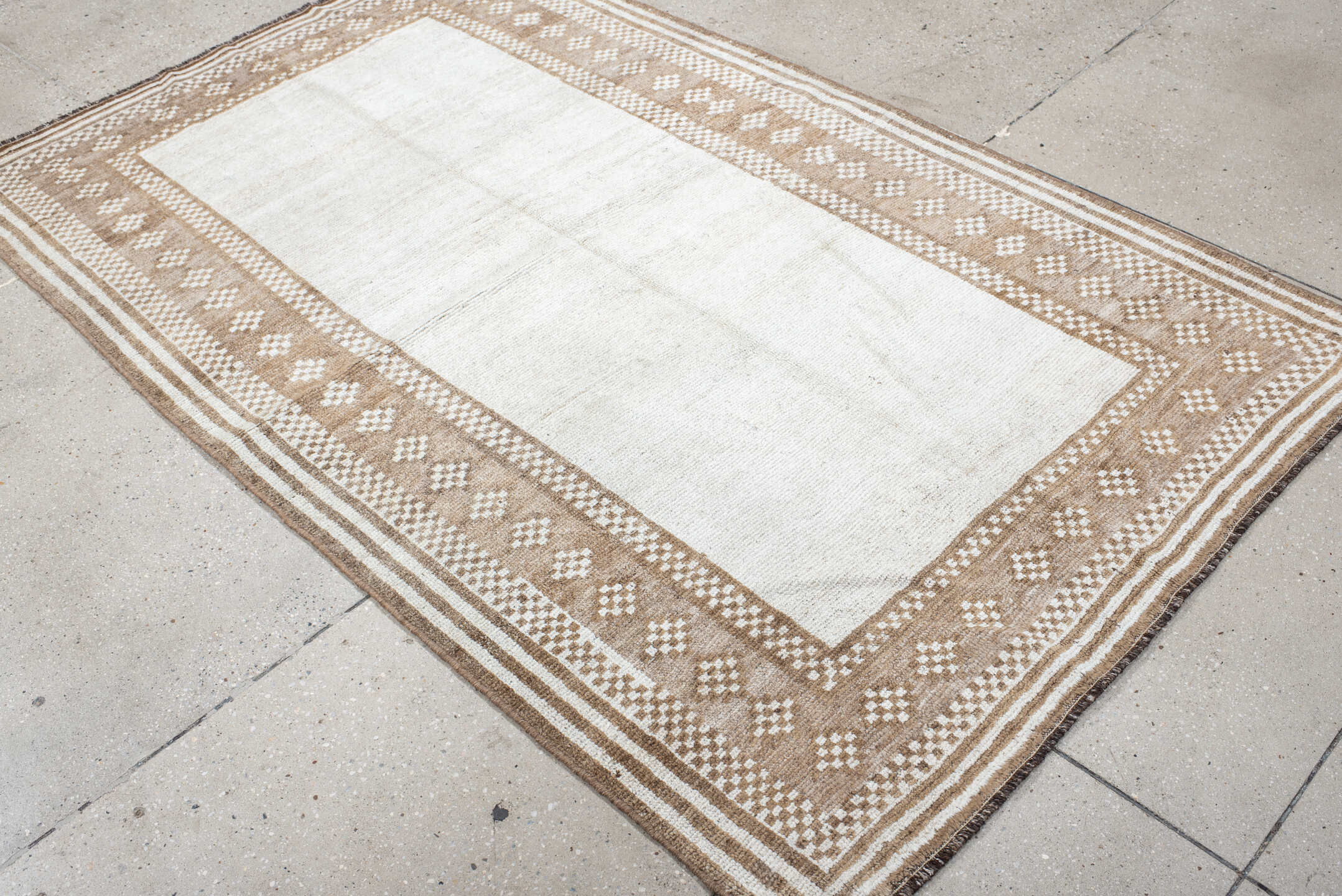4' x 6' one-of-a-kind handmade vintage Gabbe small size rug. Color palette: ivory, camel, taupe, cream, brown, beige, gray