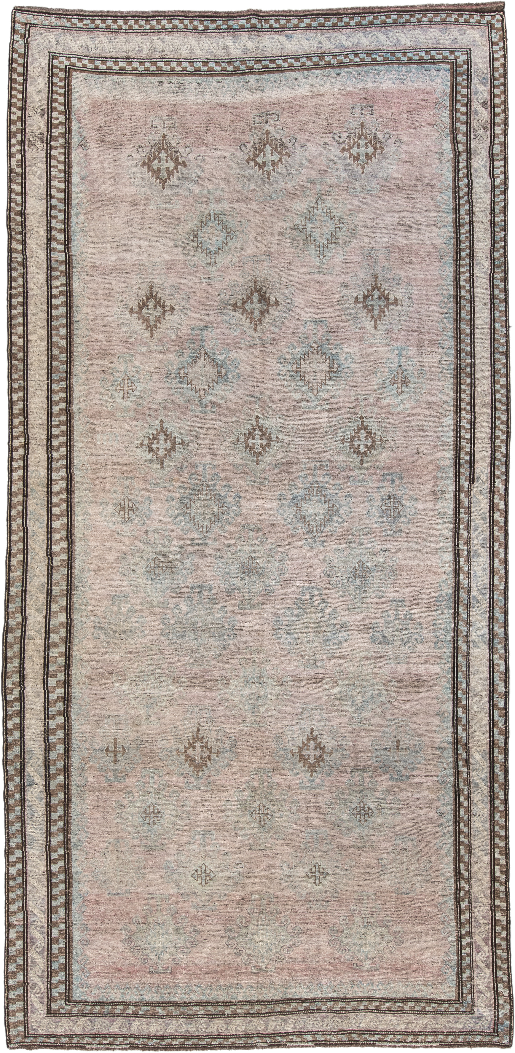 5' x 11' one-of-a-kind handmade vintage  rug. Color palette: blush, ivory, taupe, pale blue, brown, beige, pink, gray