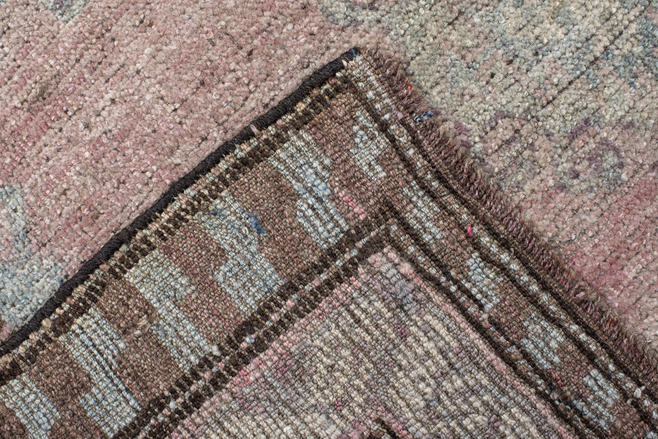 5' x 11' one-of-a-kind handmade vintage  rug. Color palette: blush, ivory, taupe, pale blue, brown, beige, pink, gray