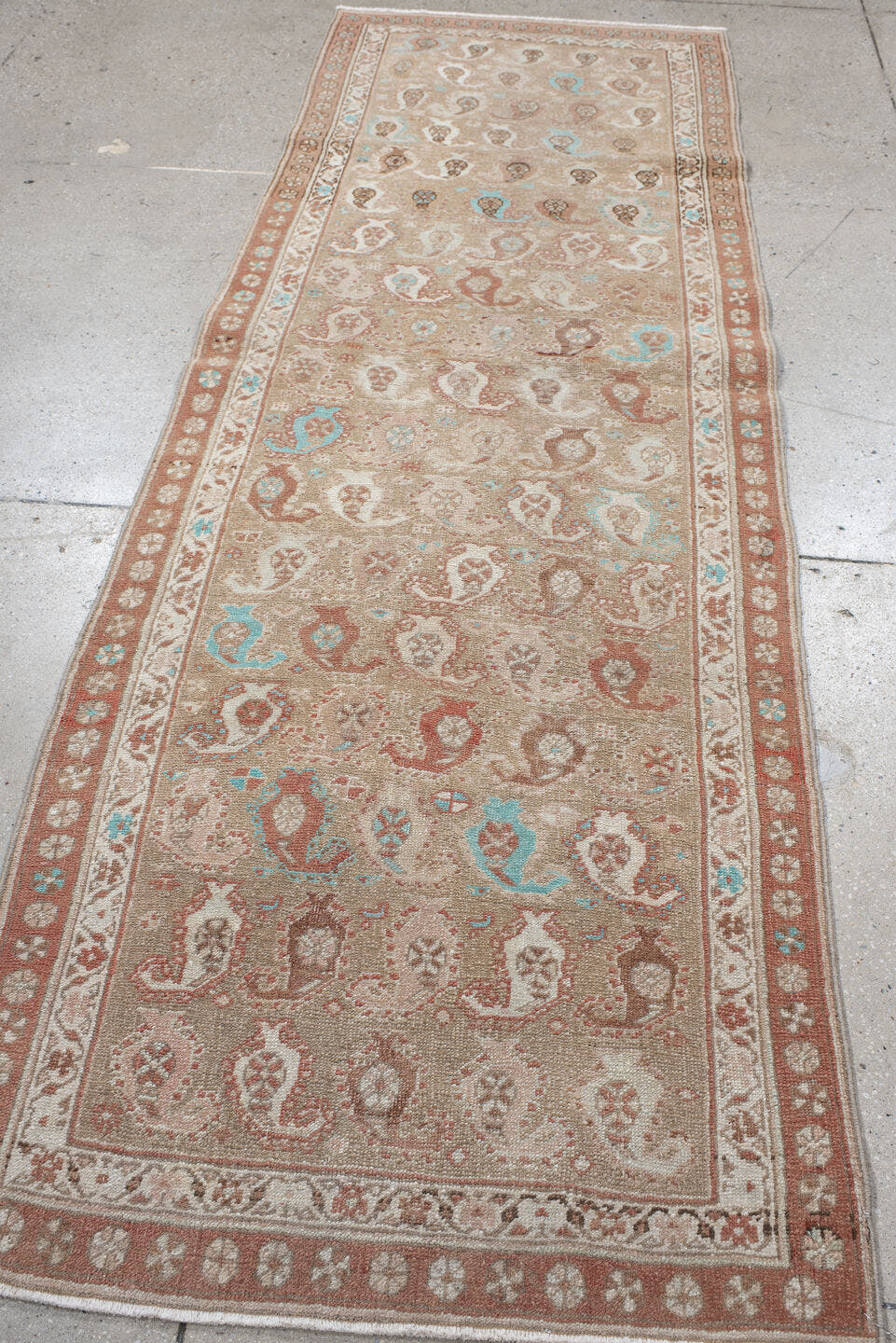 3' x 9' one-of-a-kind handmade vintage Sarab runner rug. Color palette: camel, terra cotta, ivory, taupe, sky blue, tan