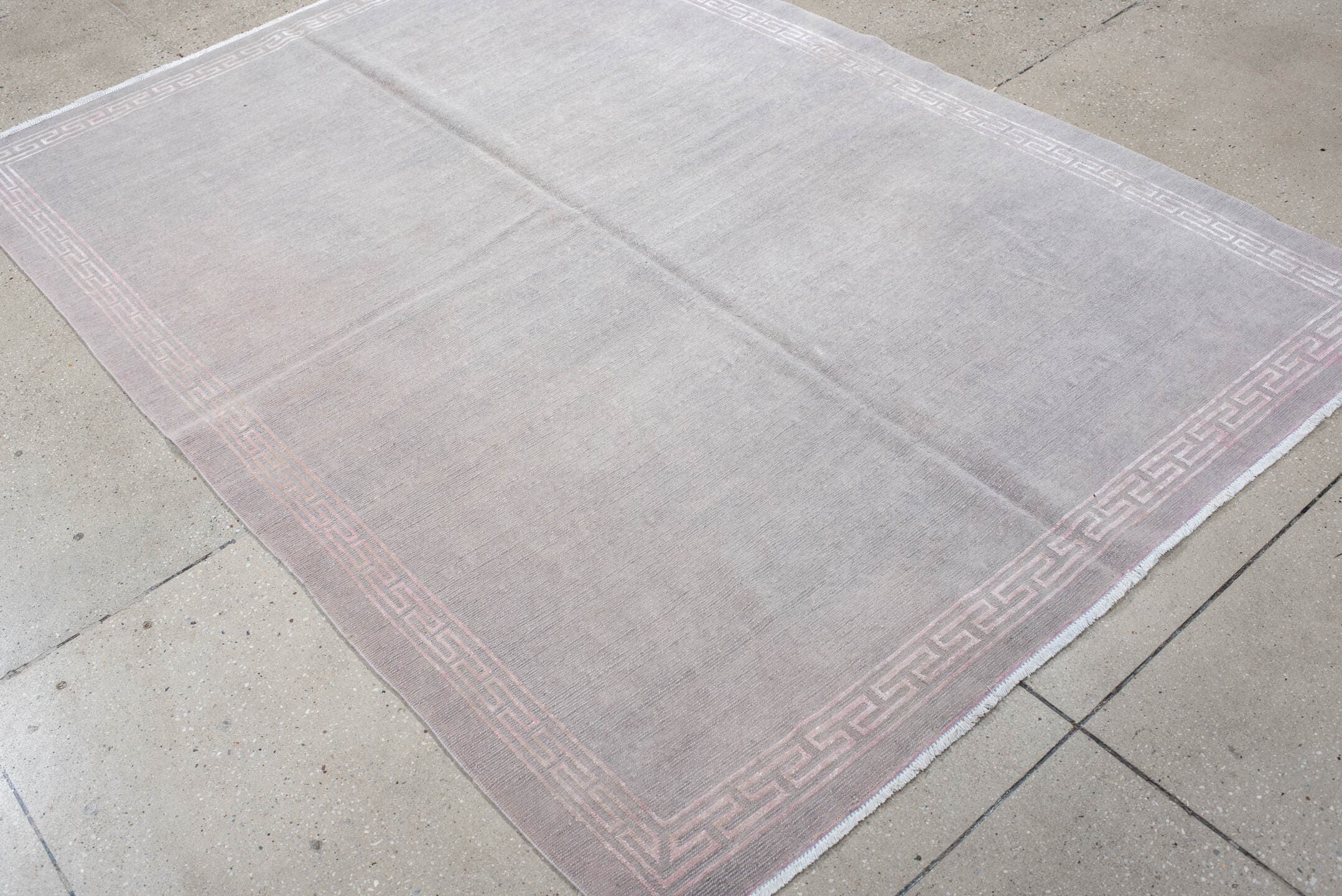 5' x 7' one-of-a-kind handmade vintage Nepal rug. Color palette: taupe, ivory, beige, cream, pale gray, gray, light gray