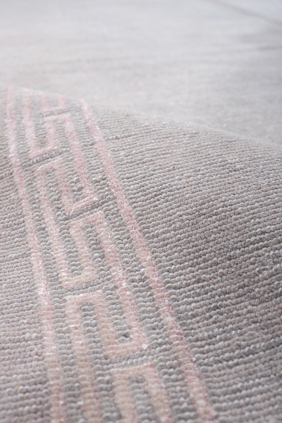 5' x 7' one-of-a-kind handmade vintage Nepal rug. Color palette: taupe, ivory, beige, cream, pale gray, gray, light gray