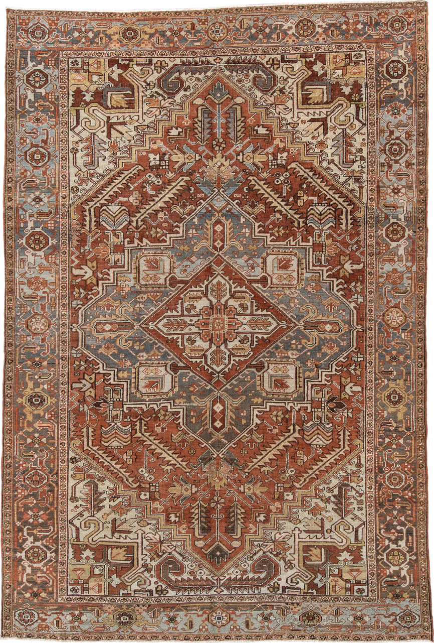 7' x 11' one-of-a-kind handmade vintage Heriz large size rug. Color palette: rust, blue, ivory, camel, taupe, brown, slate
