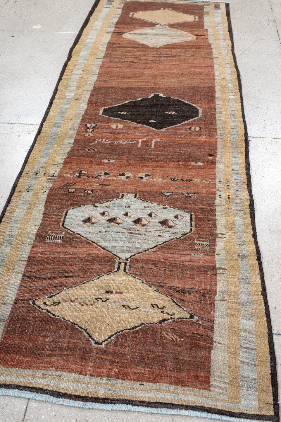 3' x 9' one-of-a-kind handmade vintage Gabbe runner rug. Color palette: rust, ivory, light blue, charcoal, taupe, brown