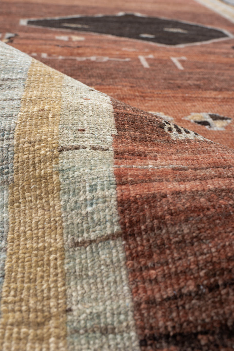 3' x 9' one-of-a-kind handmade vintage Gabbe runner rug. Color palette: rust, ivory, light blue, charcoal, taupe, brown