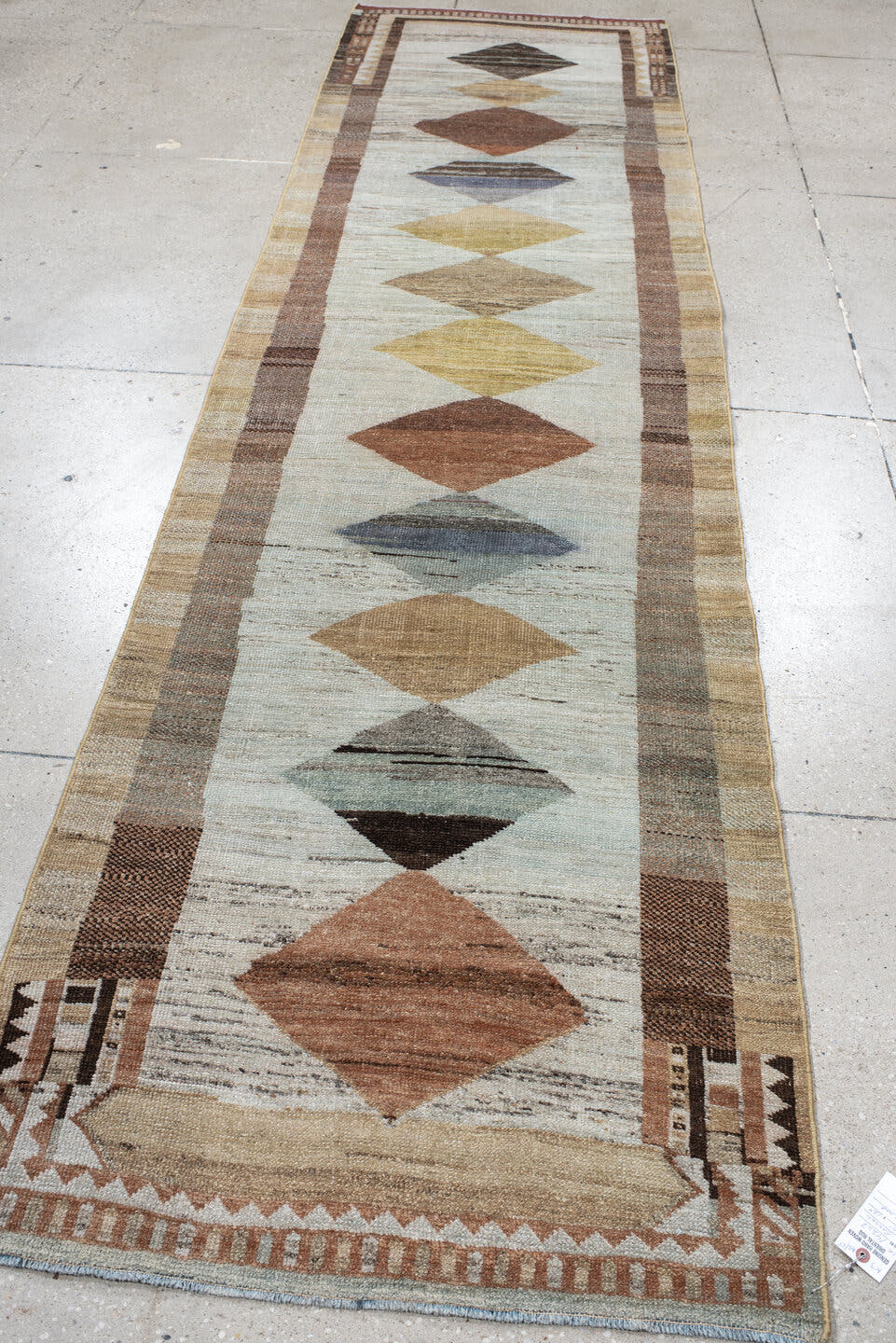 3' x 12' one-of-a-kind handmade vintage Gabbe runner rug. Color palette: ivory, taupe, rust, camel, slate, brown, sage