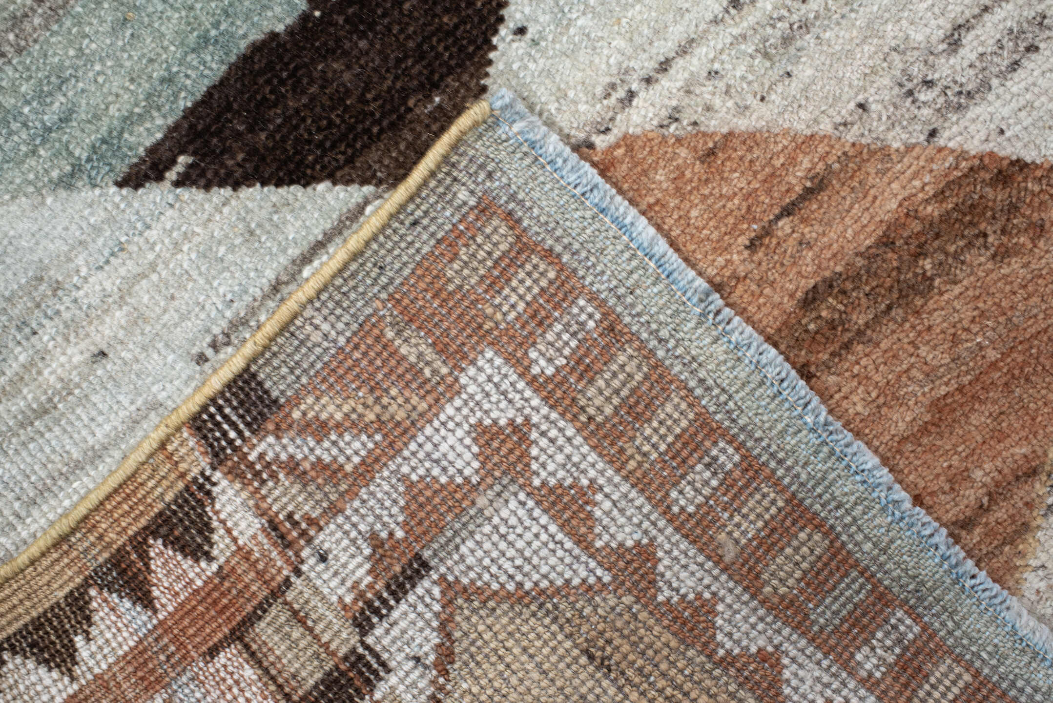 3' x 12' one-of-a-kind handmade vintage Gabbe runner rug. Color palette: ivory, taupe, rust, camel, slate, brown, sage