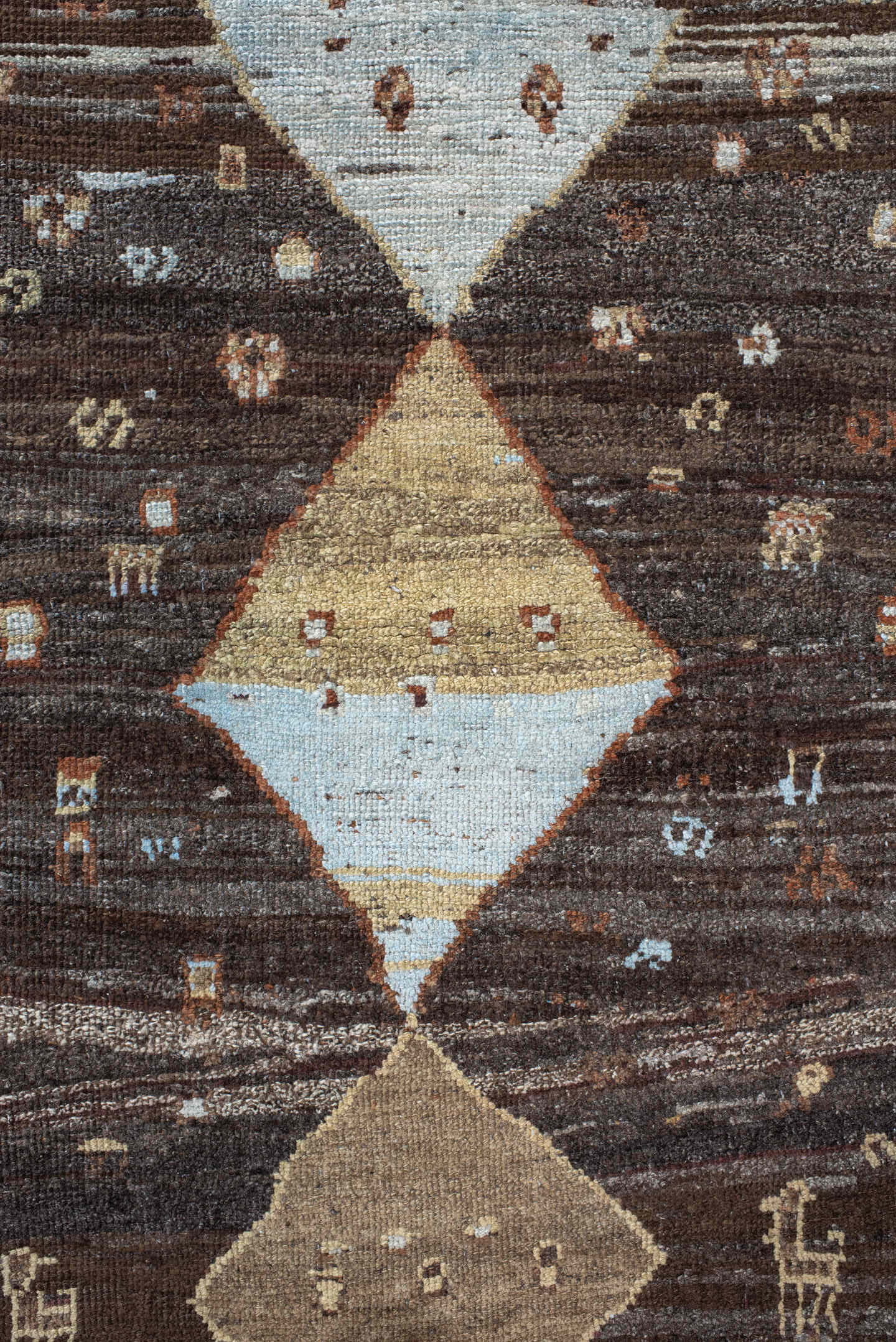 3' x 11' one-of-a-kind handmade vintage Gabbe runner rug. Color palette: charcoal, ivory, camel, sky blue, rust, taupe