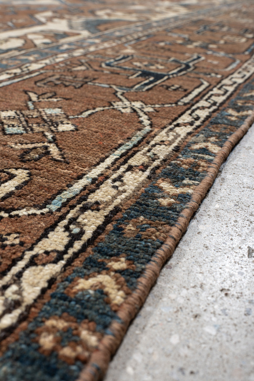 11' x 14' one-of-a-kind handmade vintage Serapi oversize rug. Color palette: gray, blue, brown, black, off-white, dark gray