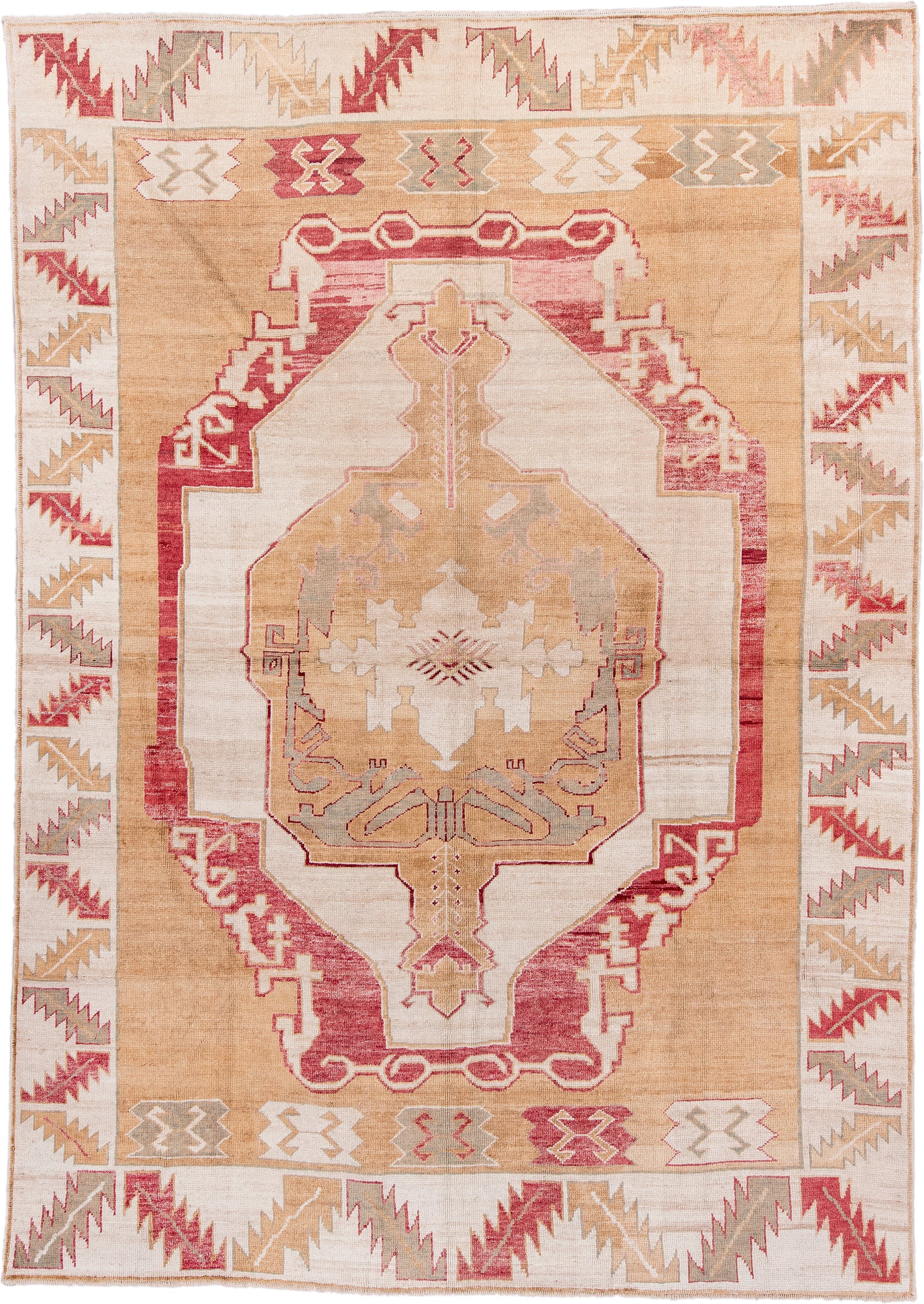 9' x 13' one-of-a-kind handmade vintage Kars large size rug. Color palette: camel, ivory, rose, taupe, sage, beige, pink