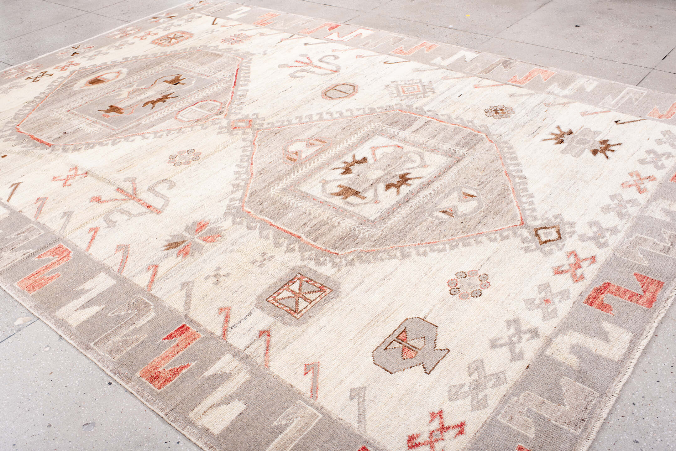 9' x 12' one-of-a-kind handmade vintage Kars large size rug. Color palette: ivory, taupe, light gray, coral, brown, beige