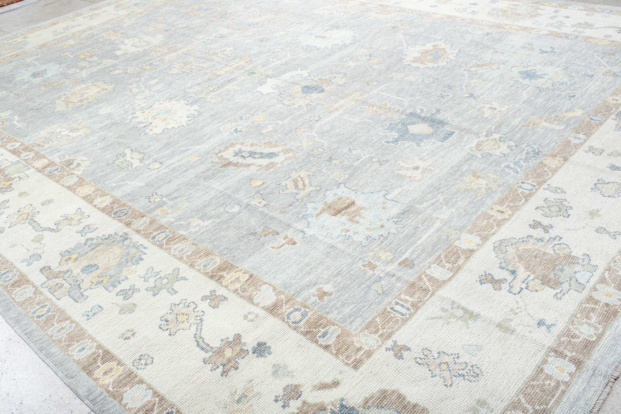 13' x 18' one-of-a-kind handmade vintage Oushak oversize rug. Color palette: pale blue, ivory, taupe, beige, gold