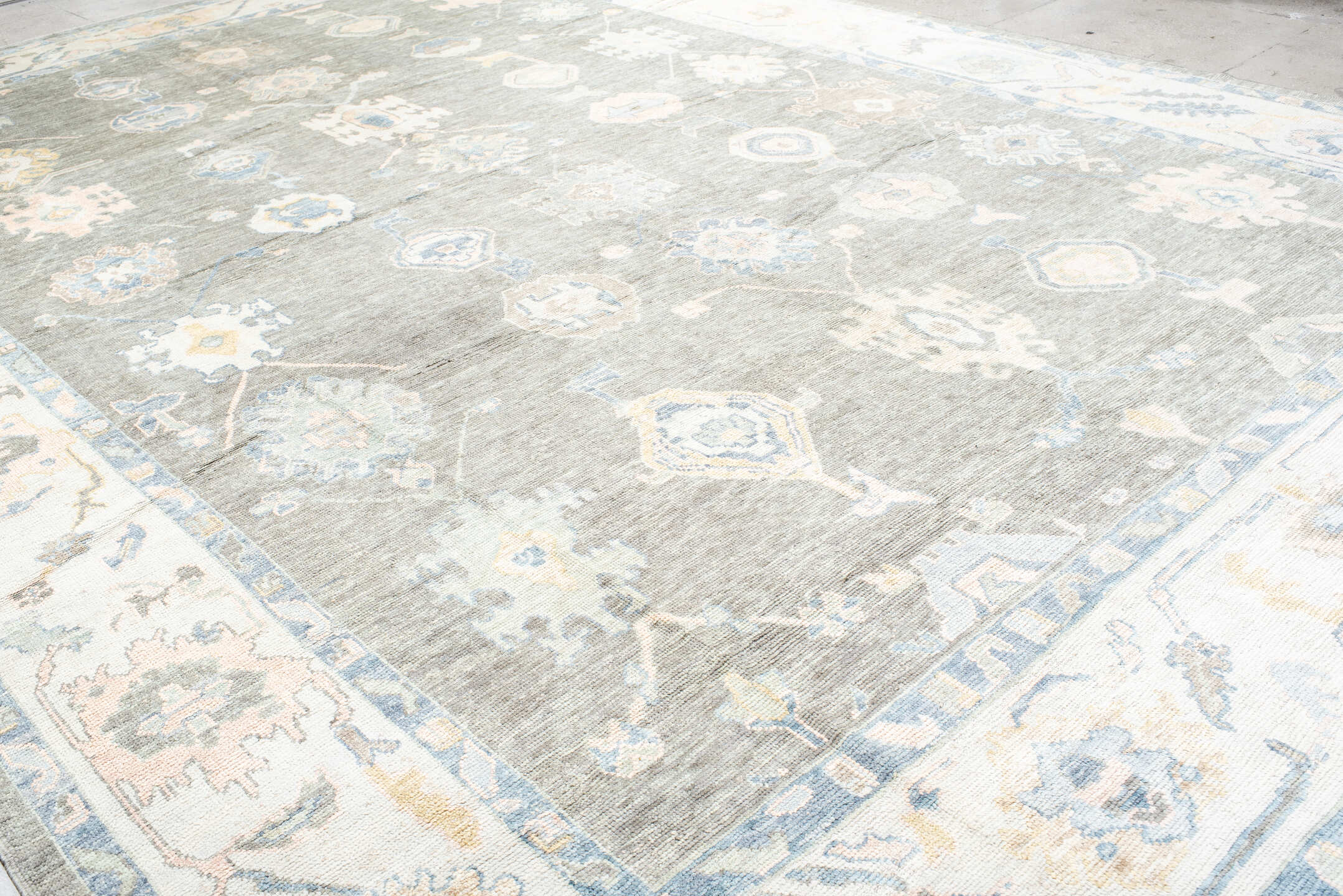 13' x 20' one-of-a-kind handmade vintage Oushak oversize rug. Color palette: gray, ivory, sky_blue, taupe, soft_gold, cream