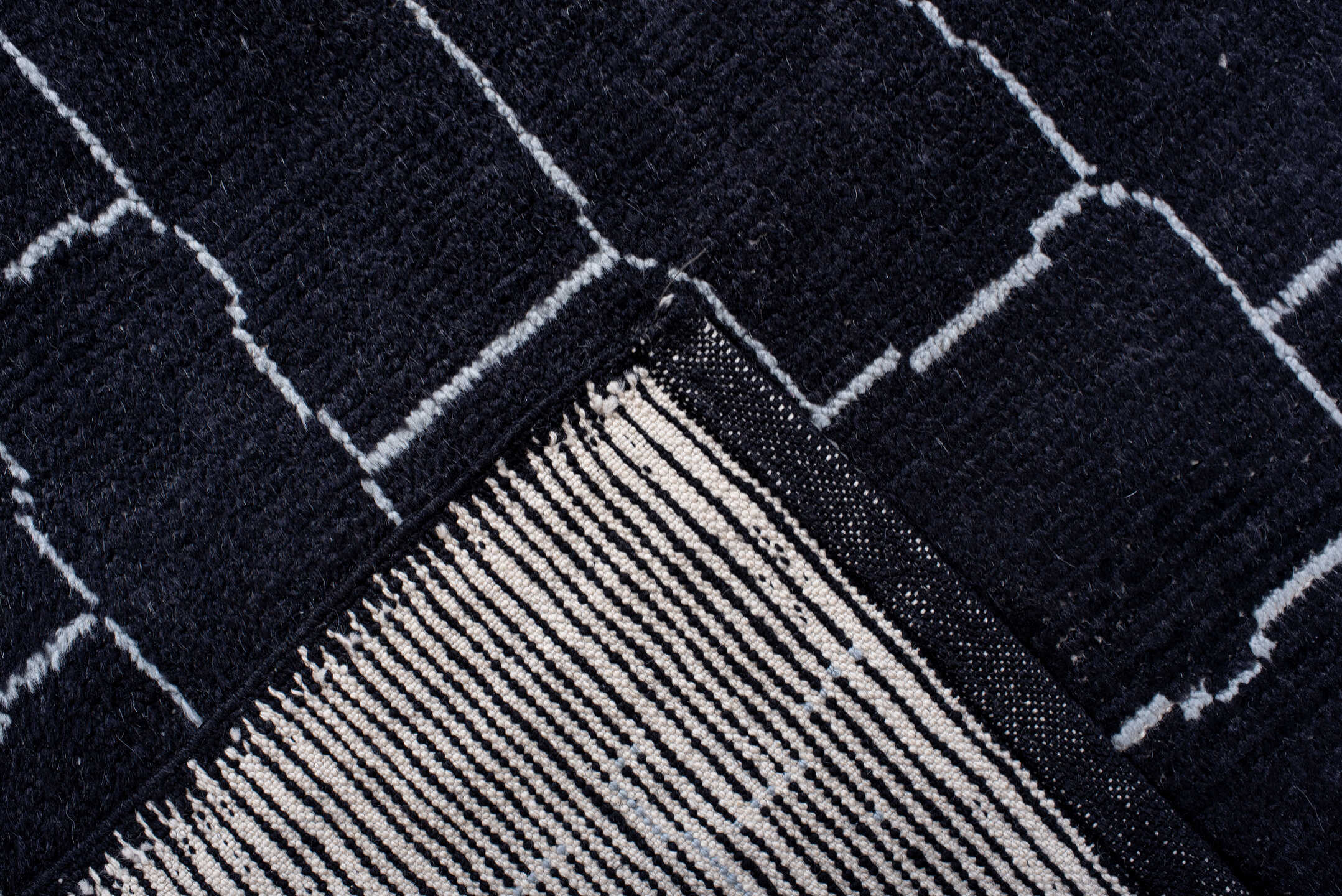 7' x 9' one-of-a-kind handmade vintage Moroccan rug. Color palette: gray, light blue, blue, light gray, off-white, black