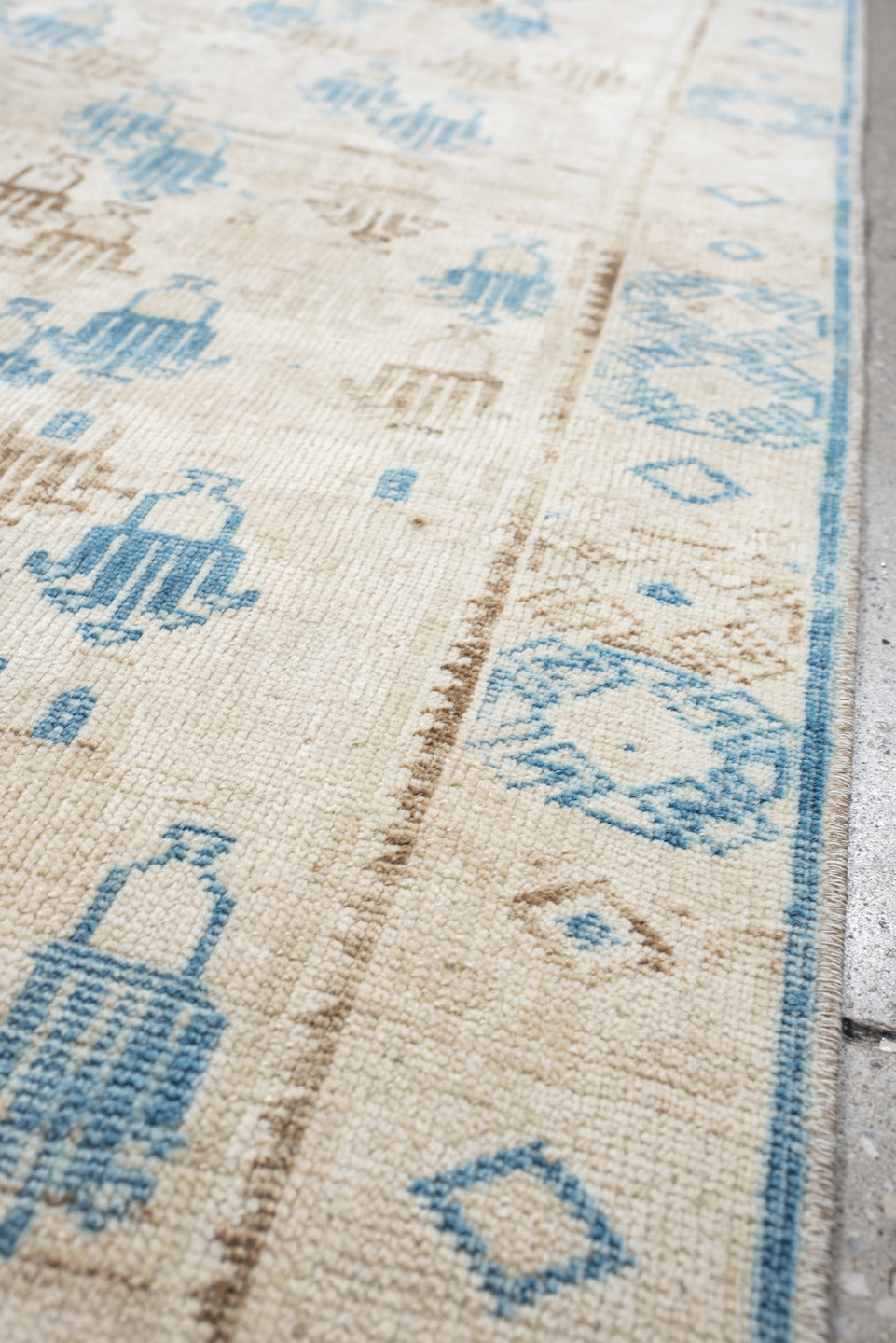 3' x 6' one-of-a-kind handmade antique rug. Color palette: ivory, sky blue, beige, taupe, light blue, gray