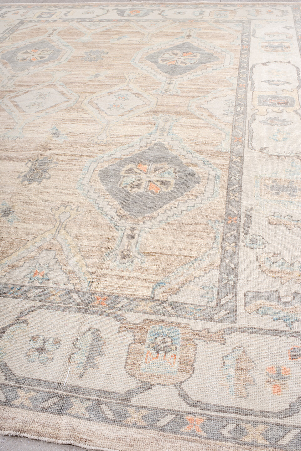 10' x 13' one-of-a-kind handmade vintage Oushak large size rug. Color palette: taupe, ivory, slate, sky blue, coral, beige