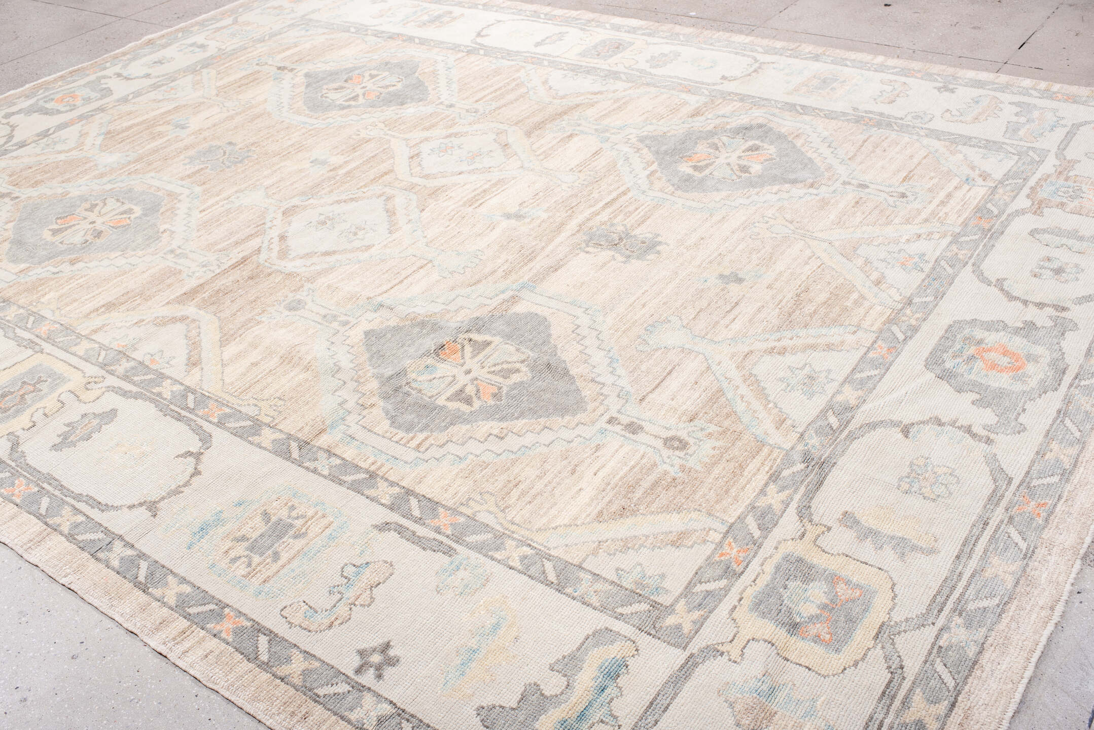 10' x 13' one-of-a-kind handmade vintage Oushak large size rug. Color palette: taupe, ivory, slate, sky blue, coral, beige