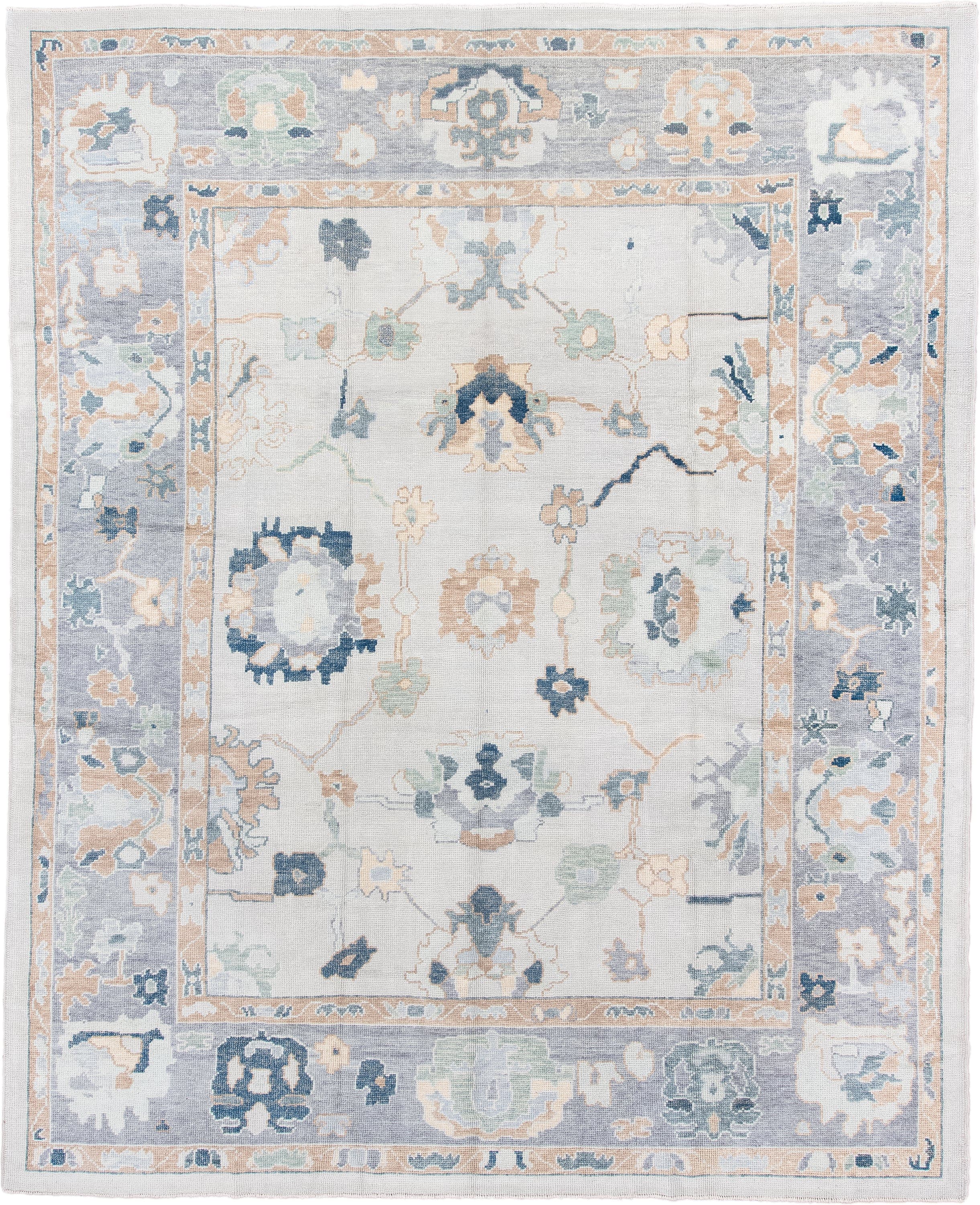 9' x 11' one-of-a-kind handmade vintage Oushak large size rug. Color palette: ivory, slate, peach, sage, navy, cream, taupe