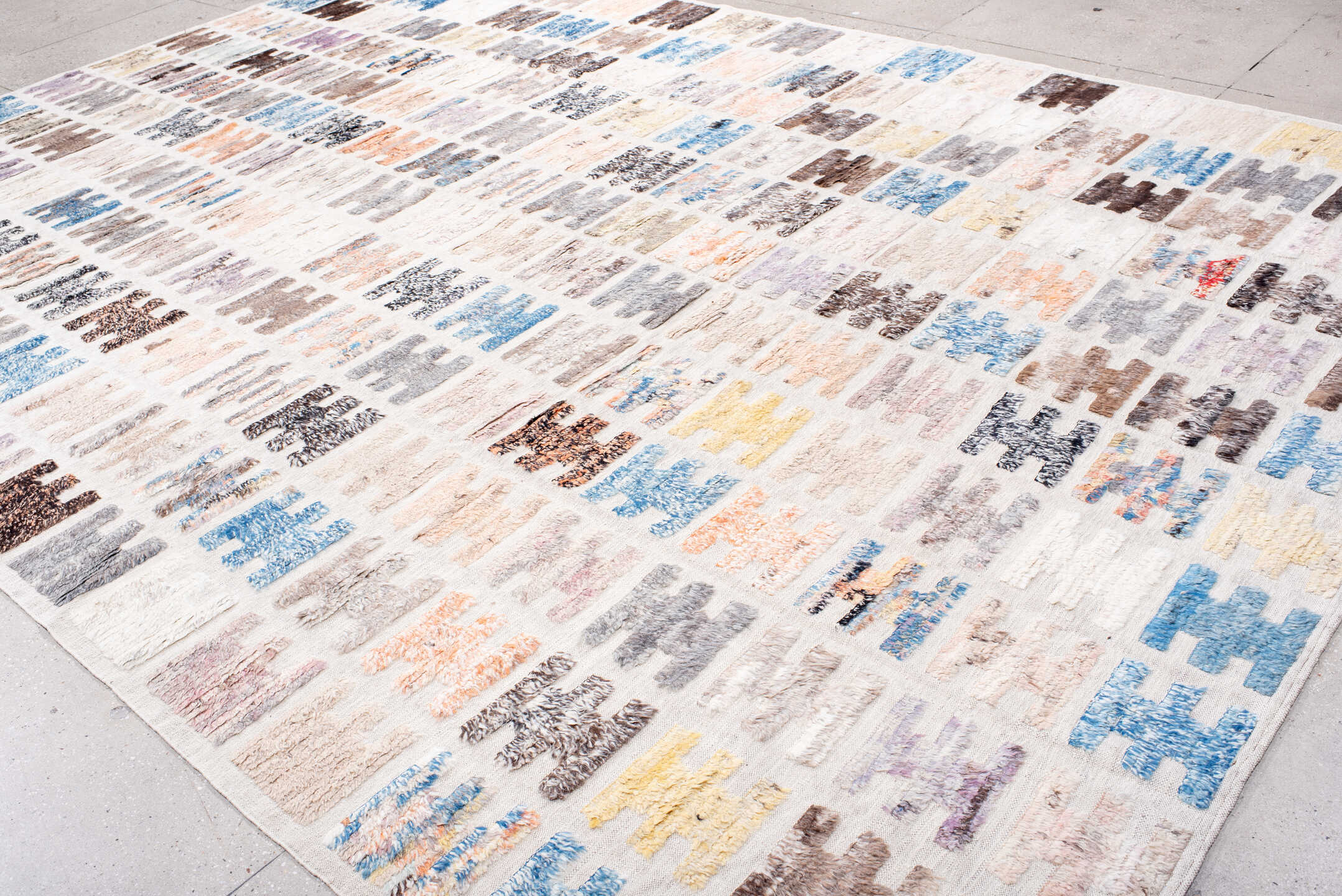 10' x 14' one-of-a-kind handmade vintage Tulu large size rug. Color palette: ivory, taupe, sky blue, charcoal, brown, peach