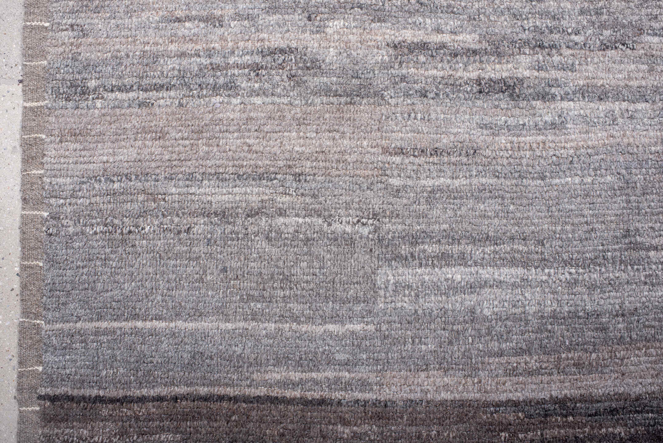 6' x 9' one-of-a-kind handmade vintage Tulu large size rug. Color palette: gray, ivory, taupe, charcoal, beige, brown, black
