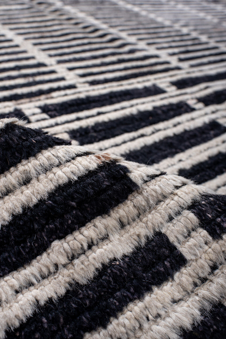6' x 8' one-of-a-kind handmade vintage Tulu medium size rug. Color palette: black, ivory, charcoal, slate, gray