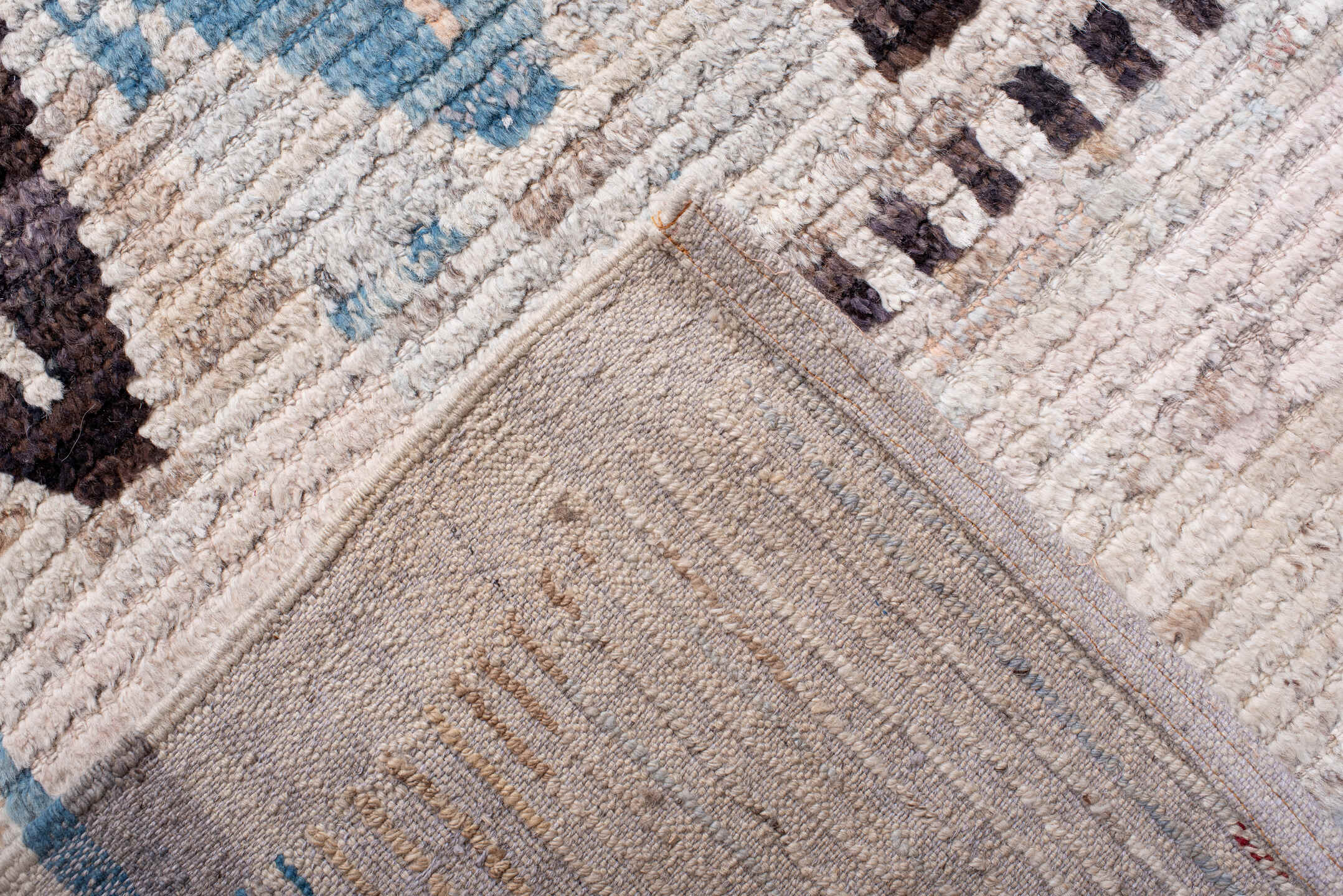 12' x 15' one-of-a-kind handmade vintage Tulu oversize rug. Color palette: ivory, charcoal, sky blue, blush, taupe
