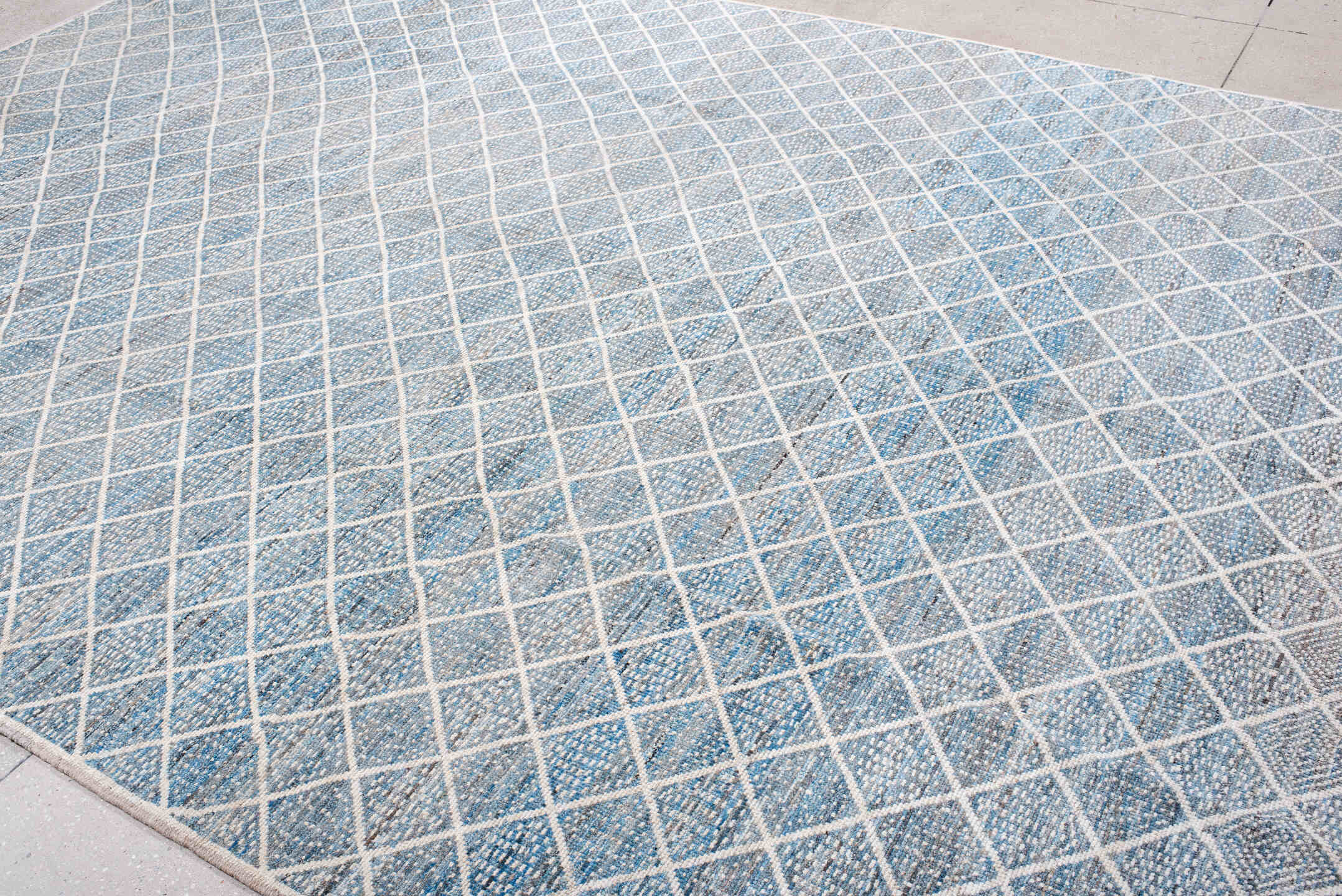 9' x 12' one-of-a-kind handmade vintage Tulu large size rug. Color palette: pale blue, ivory, sky blue, slate, cream