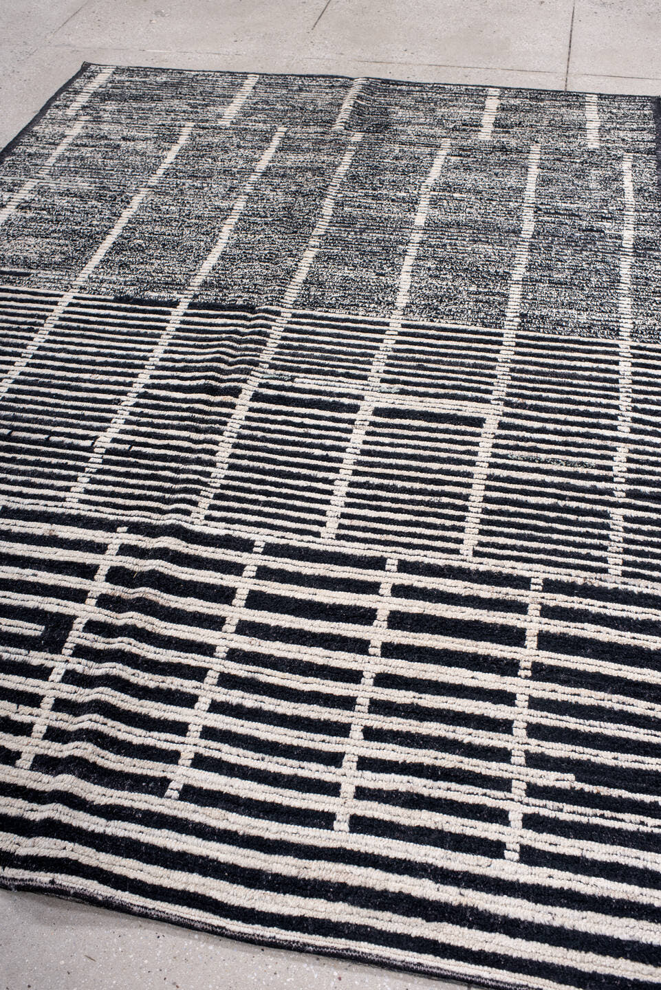 6' x 8' one-of-a-kind handmade vintage Tulu medium size rug. Color palette: ivory, charcoal, black, gray
