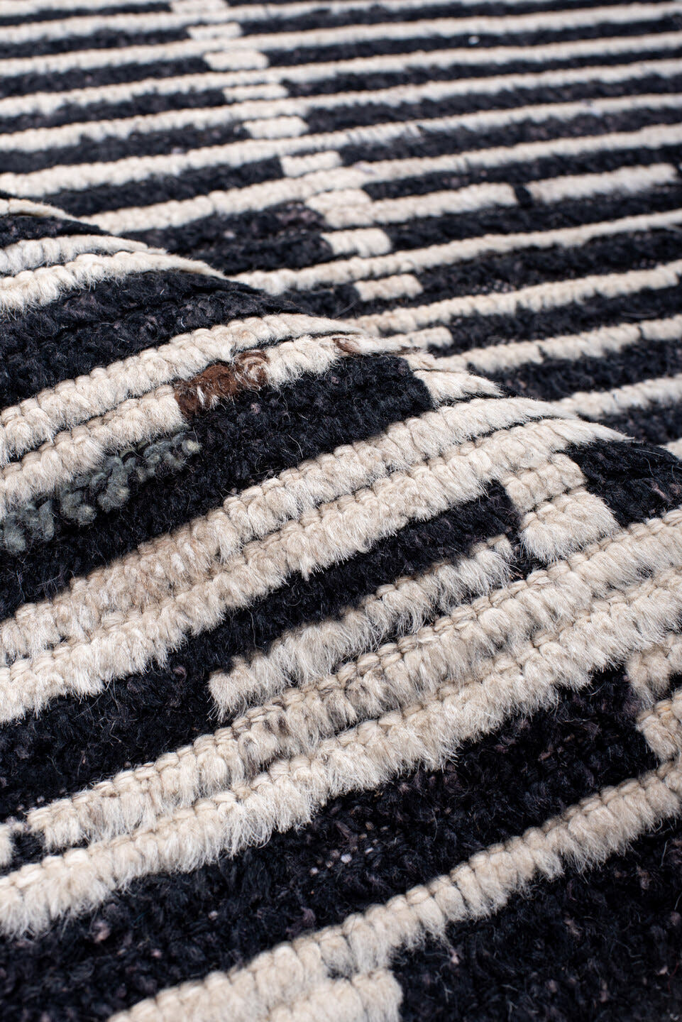 6' x 8' one-of-a-kind handmade vintage Tulu medium size rug. Color palette: ivory, charcoal, black, gray