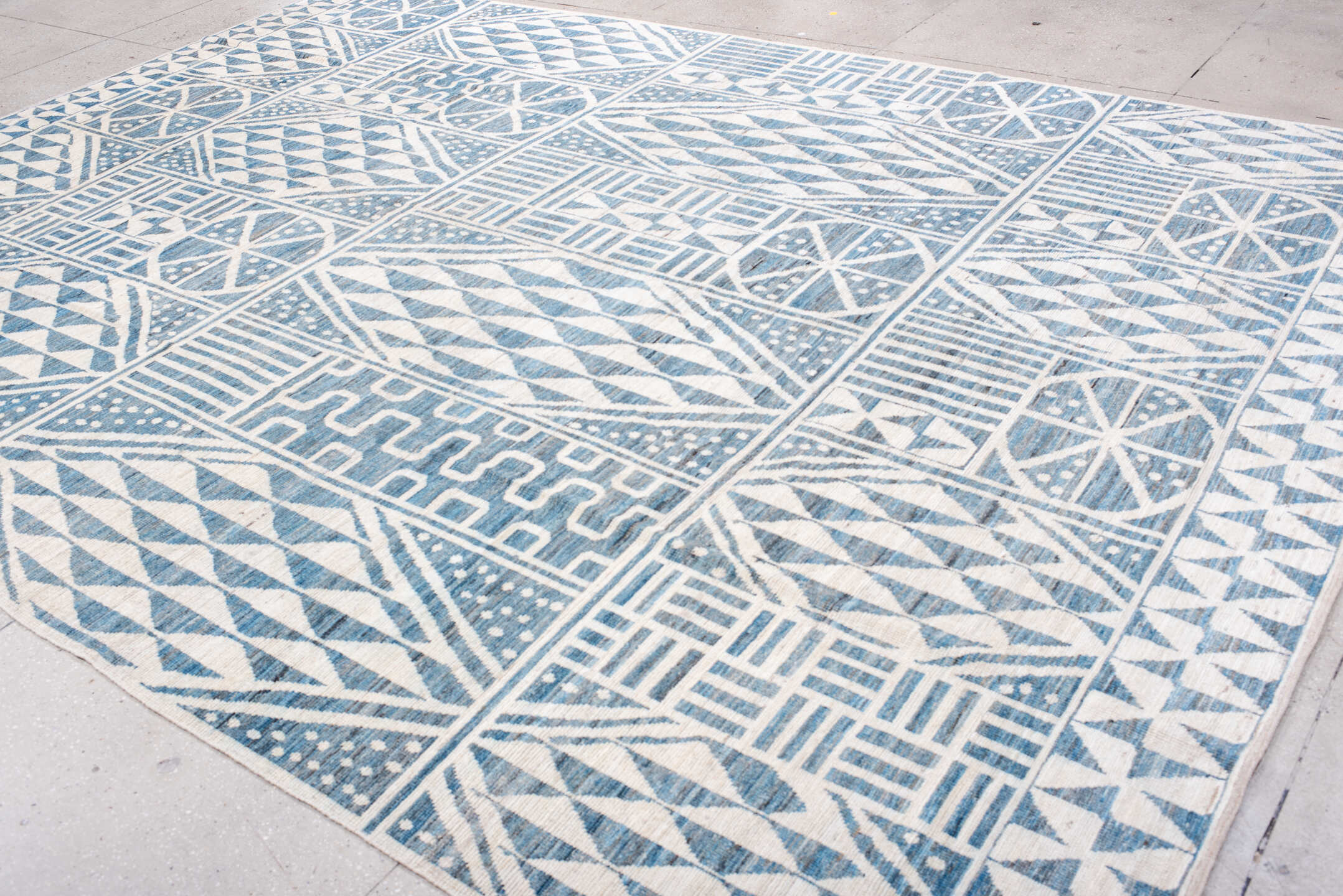 10' x 14' one-of-a-kind handmade vintage Tulu large size rug. Color palette: ivory, sky blue, powder blue, light blue
