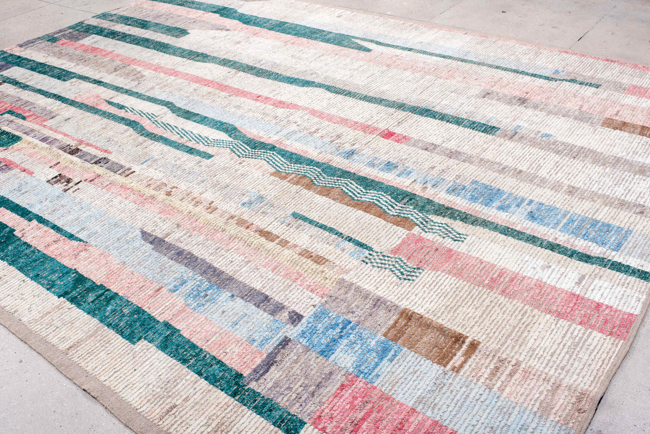 10' x 13' one-of-a-kind handmade vintage Tulu large size rug. Color palette: ivory, teal, blush, lavender, sky blue, taupe