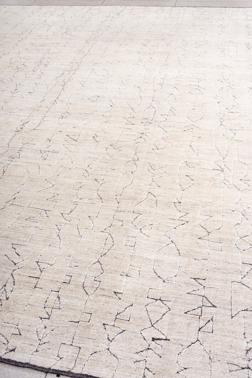 10' x 13' one-of-a-kind handmade vintage Tulu large size rug. Color palette: ivory, cream, charcoal, taupe, gray, black