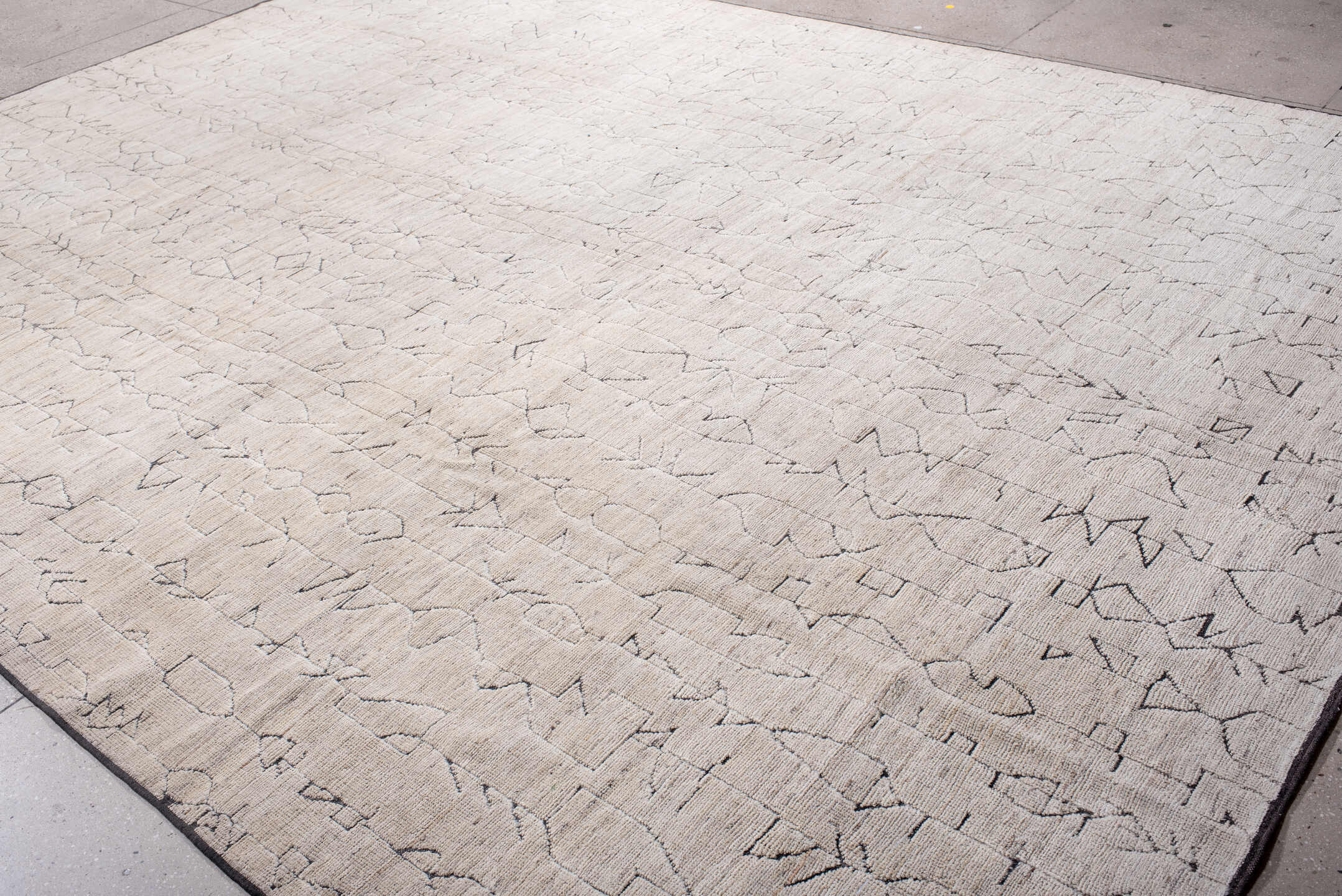 10' x 13' one-of-a-kind handmade vintage Tulu large size rug. Color palette: ivory, cream, charcoal, taupe, gray, black